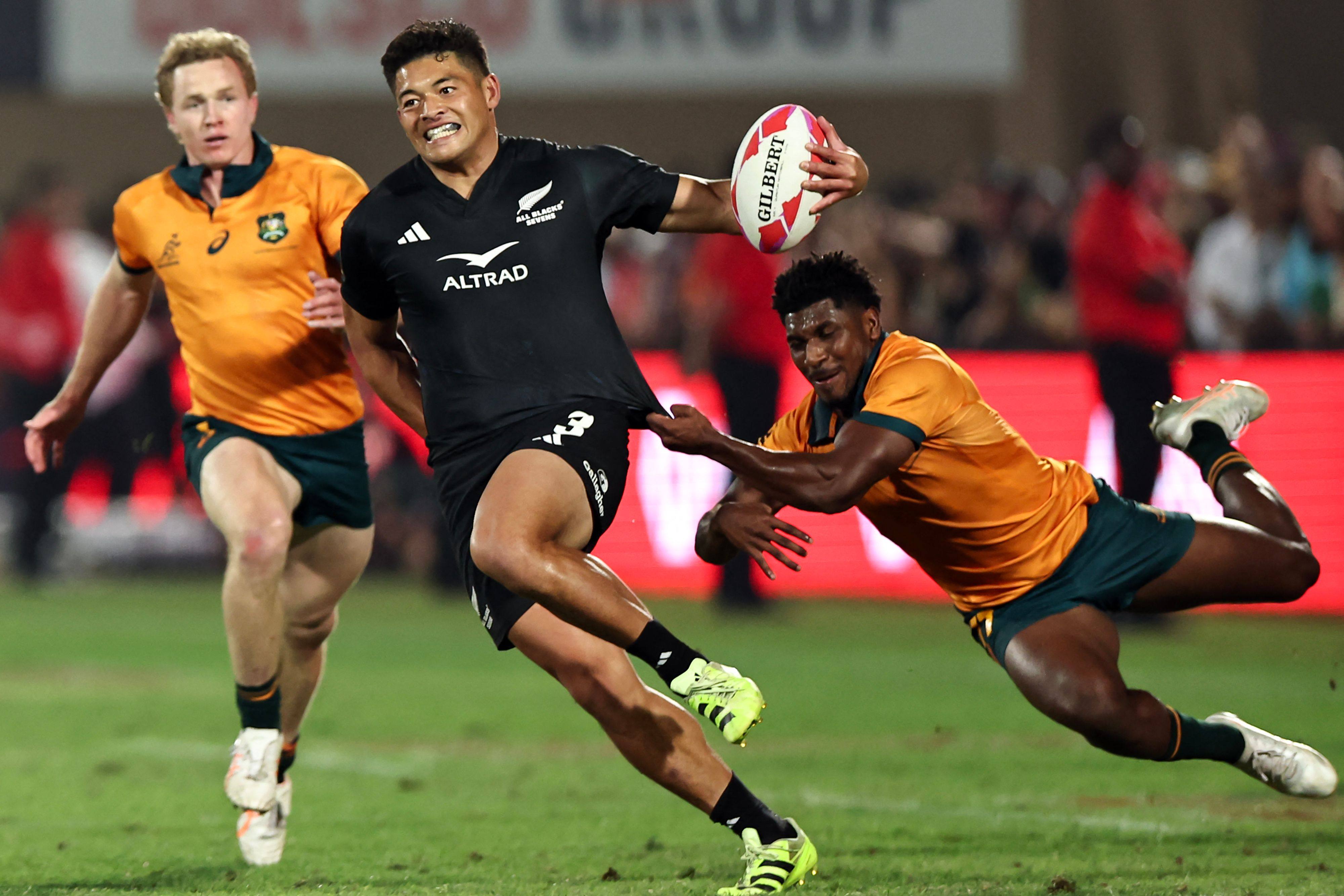The New Zealand men’s team weathered an Australian fightback to win 26-22. Photo: AFP