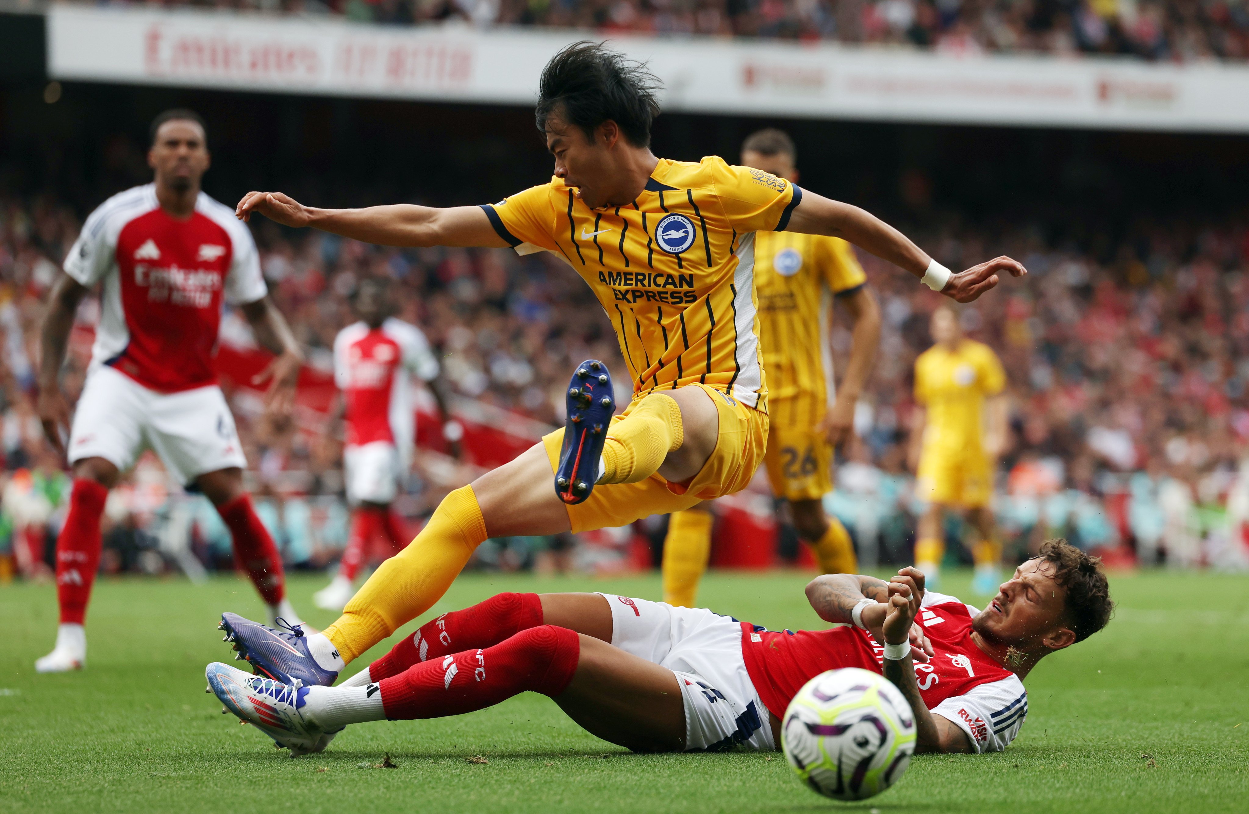 Chinese fans have called for Brighton to sack their winger Kaoru Mitoma (left), seen here in English Premier League action against Arsenal last season. Photo: EPA-EFE