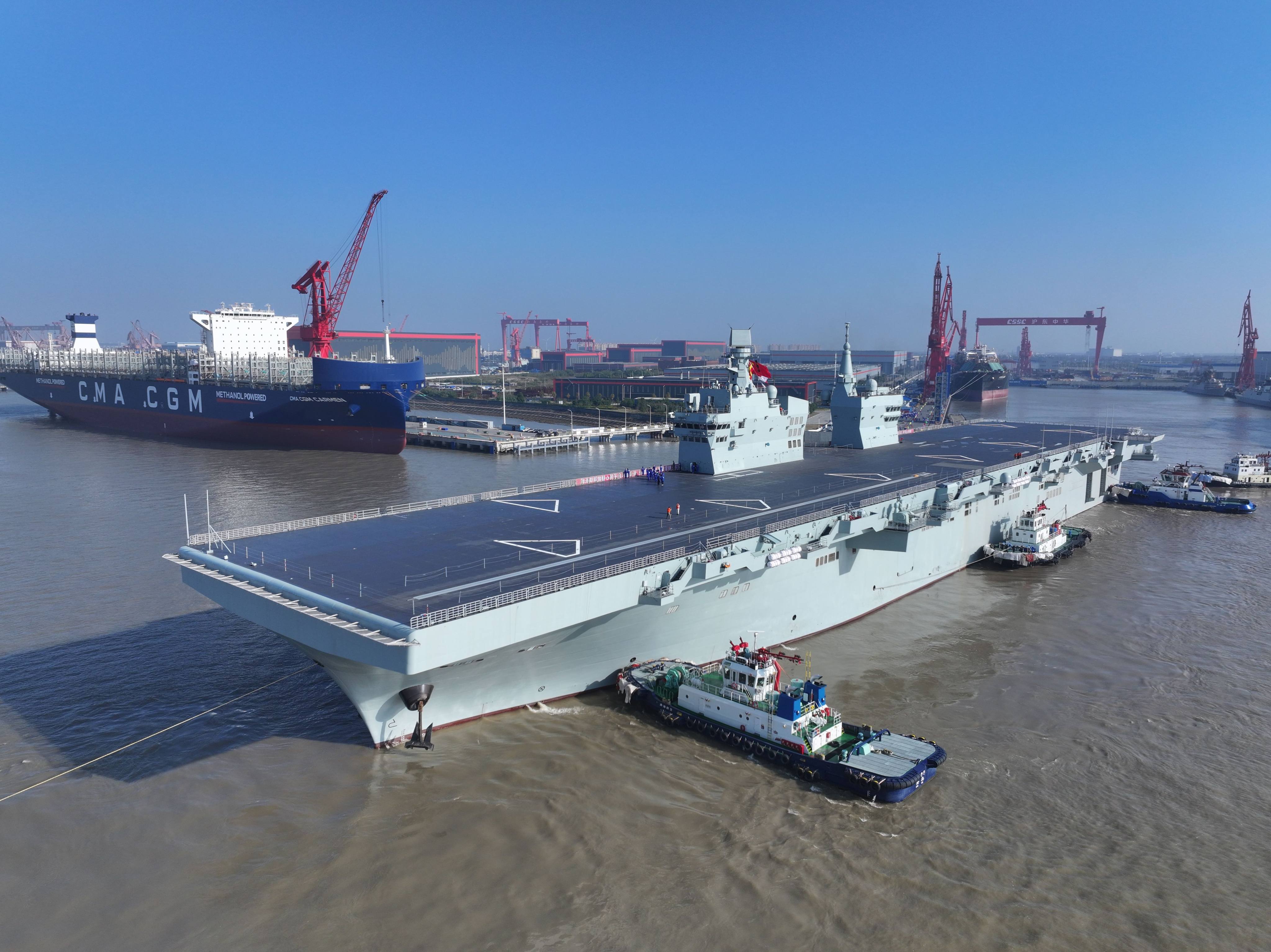 China’s first Type 076 amphibious assault ship, the Sichuan, sets sail from a shipyard in Shanghai on November 14 for its first sea trial. Photo: Xinhua