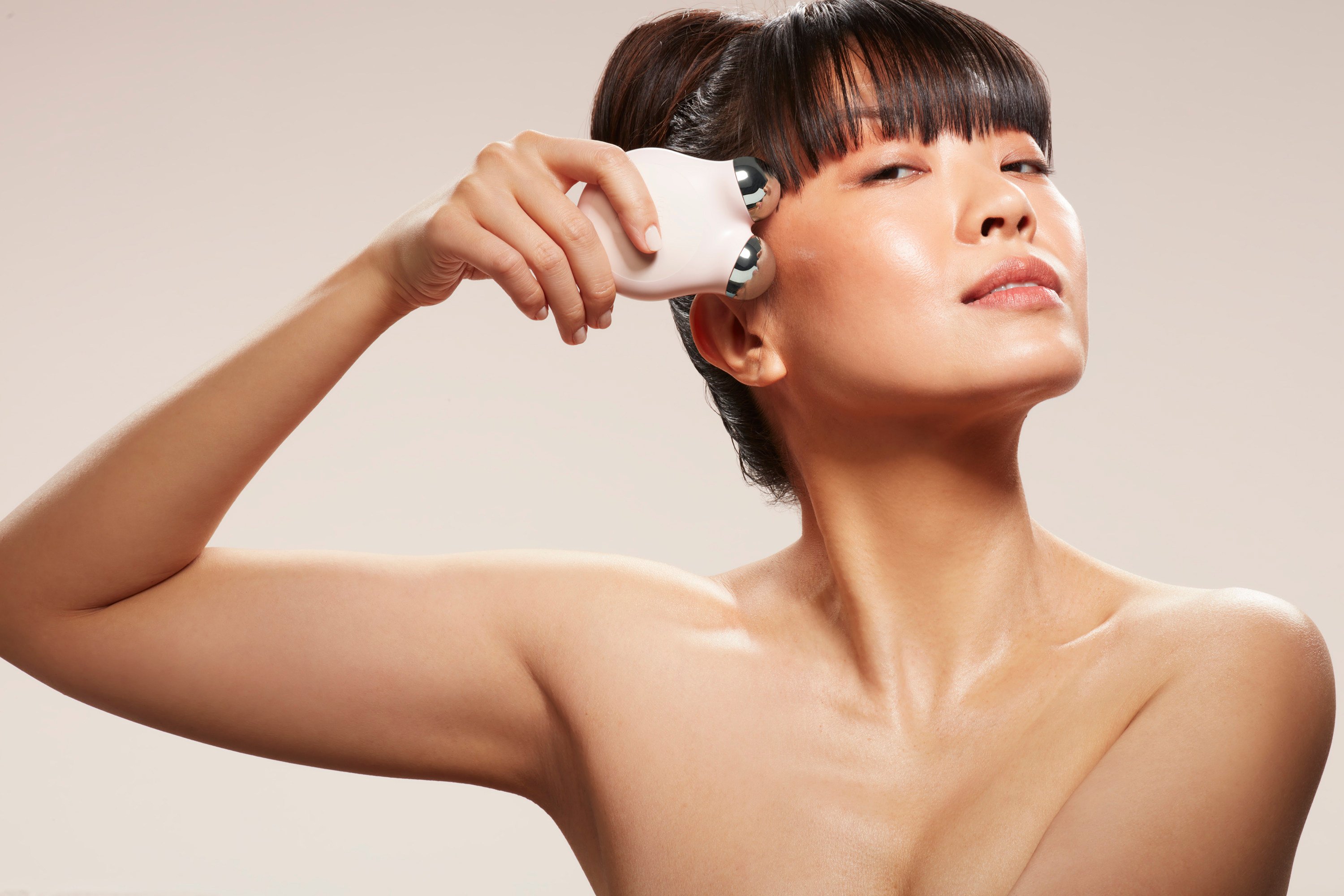 Lymphatic drainage massage gadgets, like this NuFace by Trinity, are all the rage recently. Photo: Handout