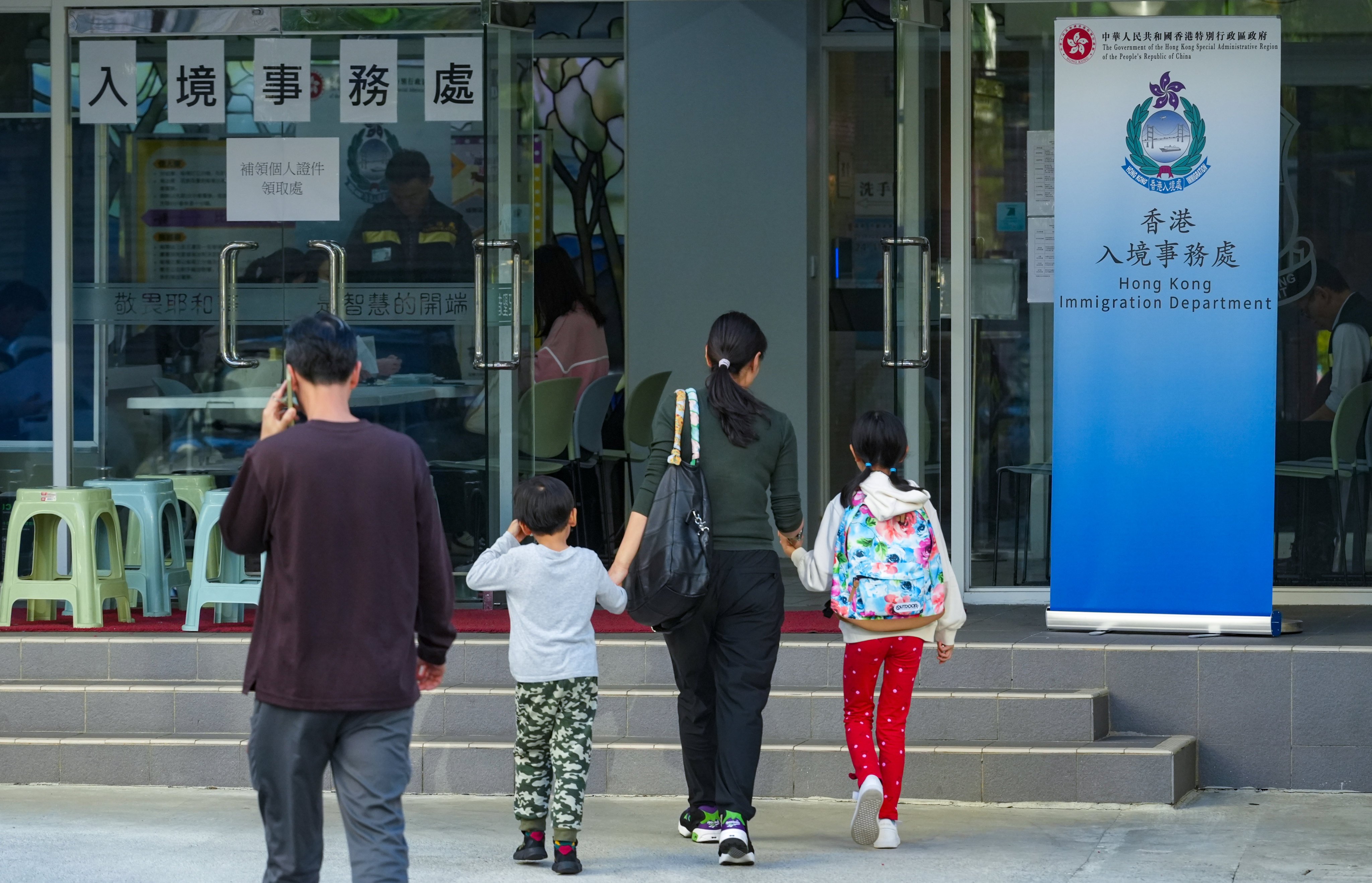 The Immigration Department said the first batch of 70 identity cards, and more than 300 travel documents and certificates were available for pickup at five locations. Photo: Sun Yeung