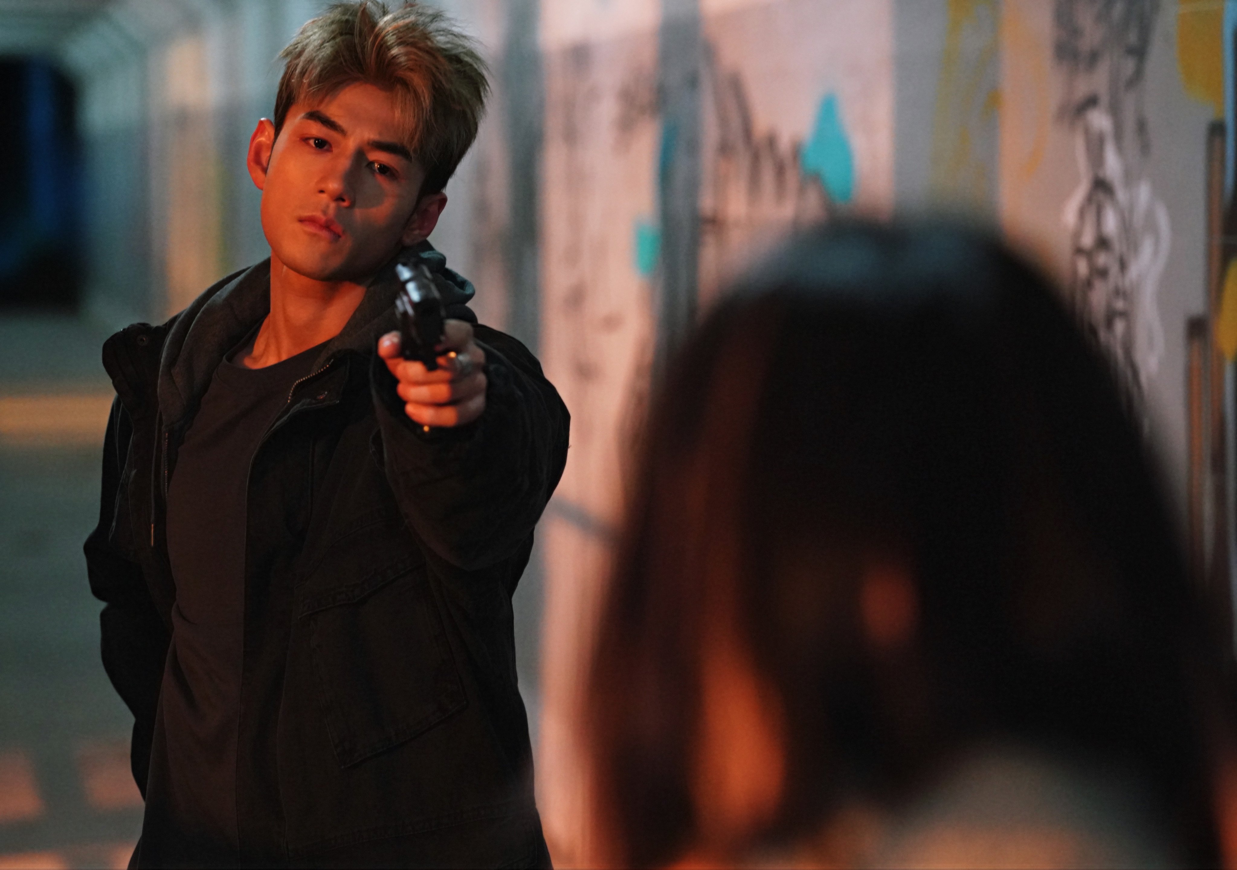 Jeffrey Ngai in a still from Road to Vendetta (category IIB; Cantonese, Japanese, English, Mandarin), directed by Njo Kui-ying. Sara Minami co-stars.