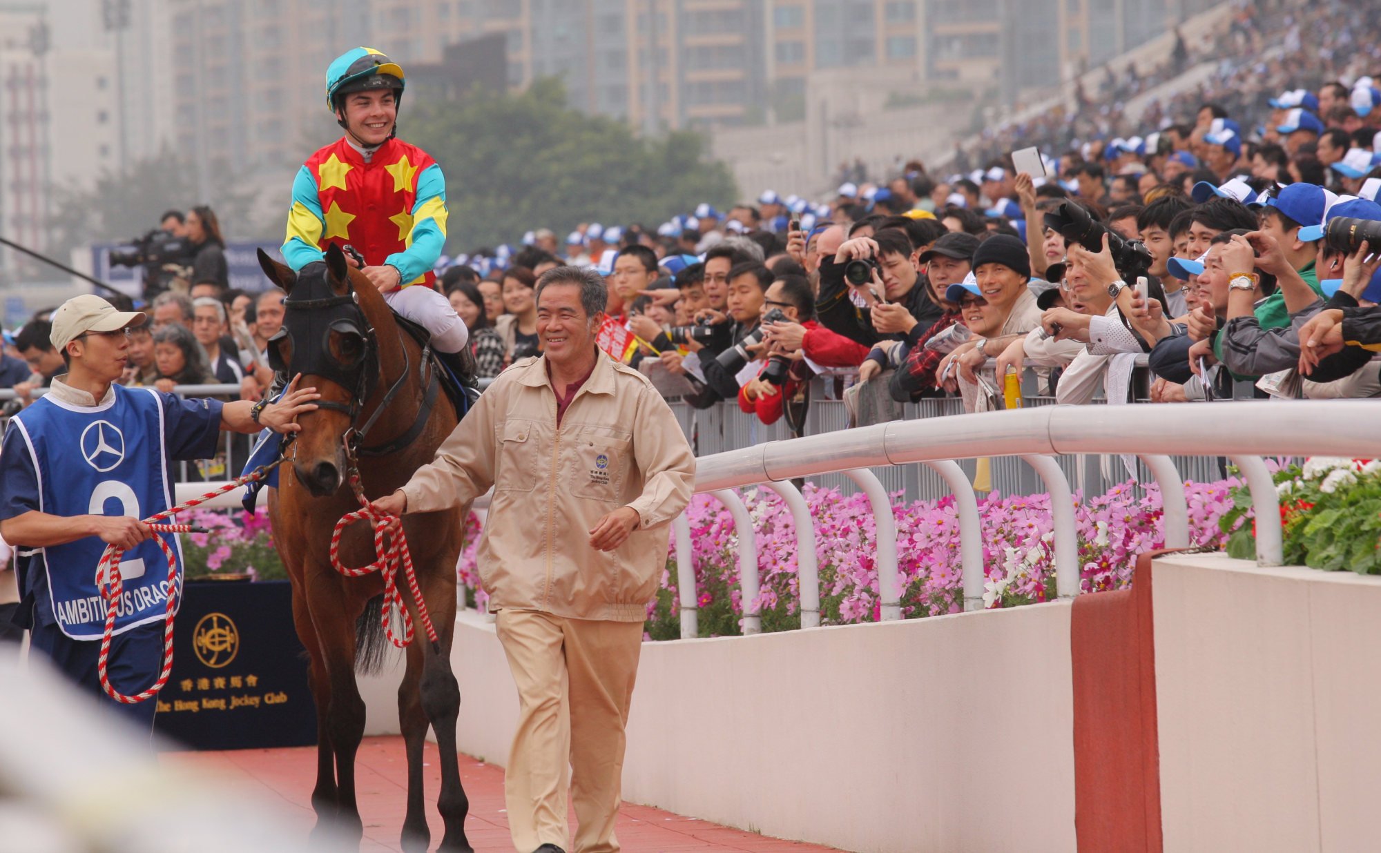 Maxime Guyon is all smiles after winning the 2011 Hong Kong Derby aboard Ambitious Dragon.