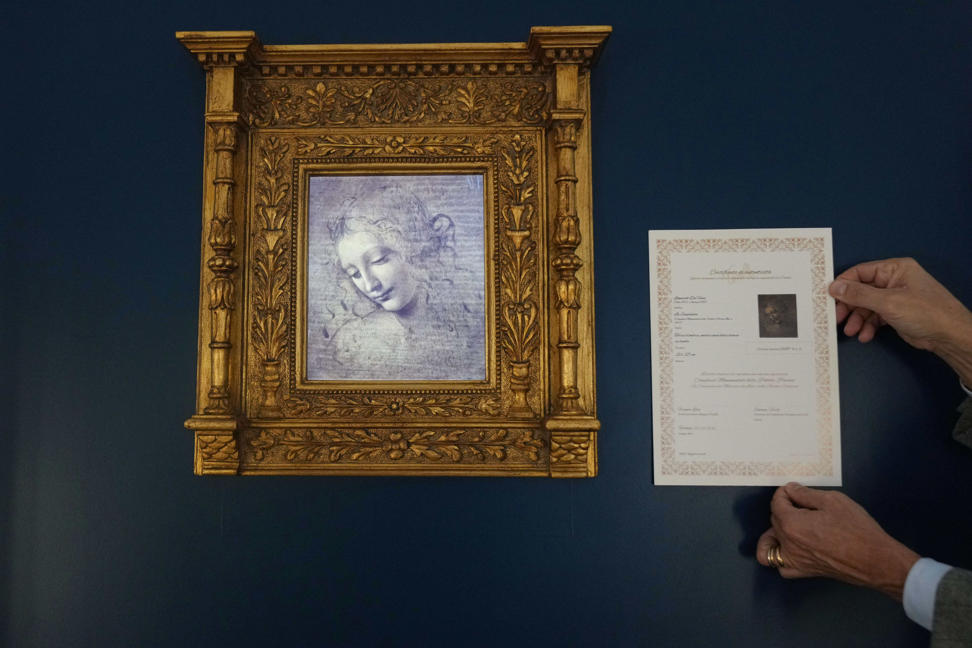 A high-definition digital version of Leonardo Da Vinci’s Lady with Dishevelled Hair hangs at the Brera Art Gallery in Milan, Italy, on November 24, 2025. Photo: AP