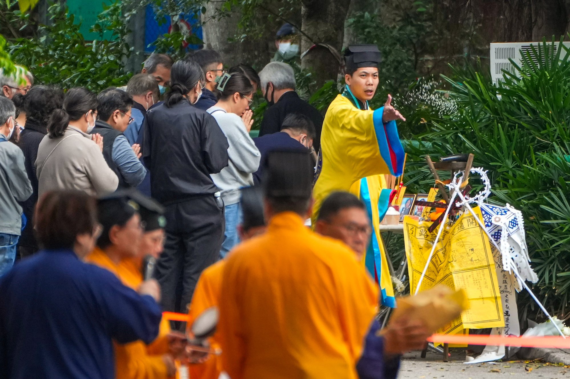 Rituals are carried out at the scene of the tragedy. Photo: Sam Tsang