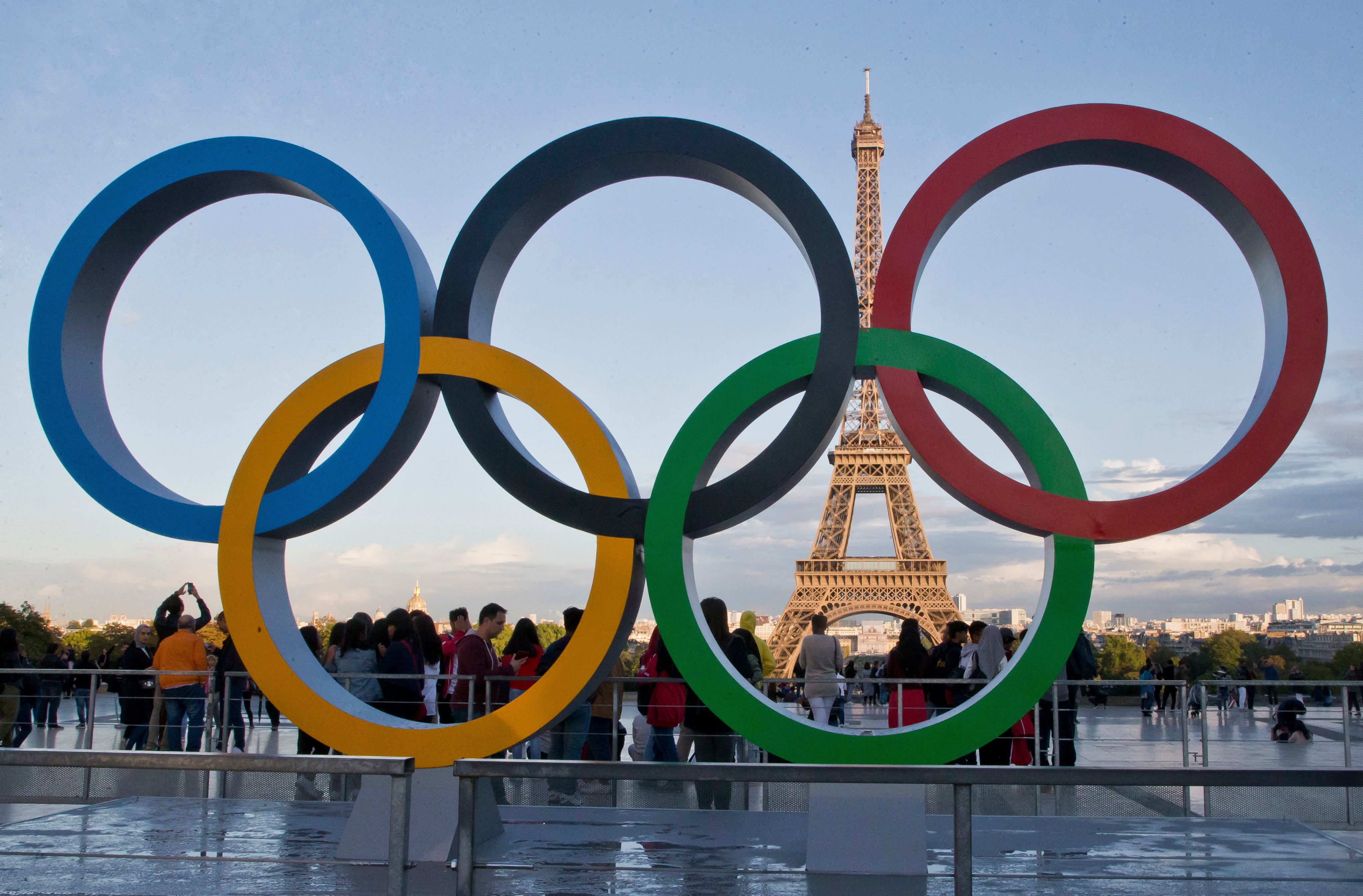 The Eiffel Tower looms behind the Olympic rings during last year’s Paris Olympics. Photo: AP