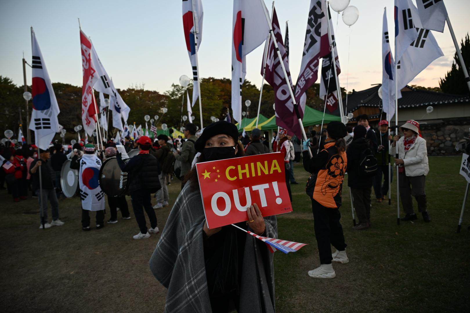 Activists hold an anti-China rally in Gyeongju, South Korea on October 29, ahead of the APEC summit. Photo: The Korea Times