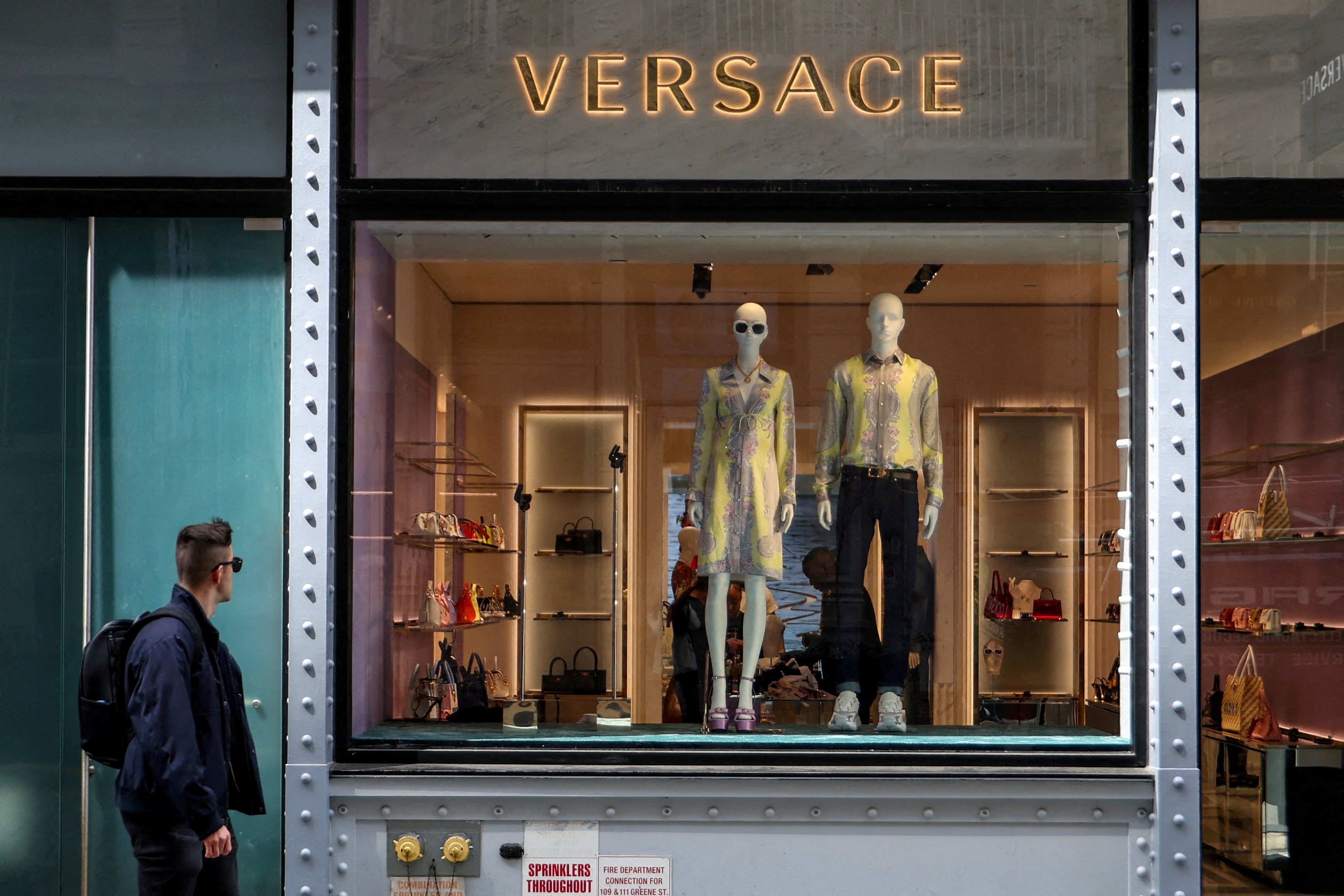 A Versace store in New York. Donatella Versace has welcomed the purchase of her family’s brand by its Milan rivals, Prada. Photo: Reuters