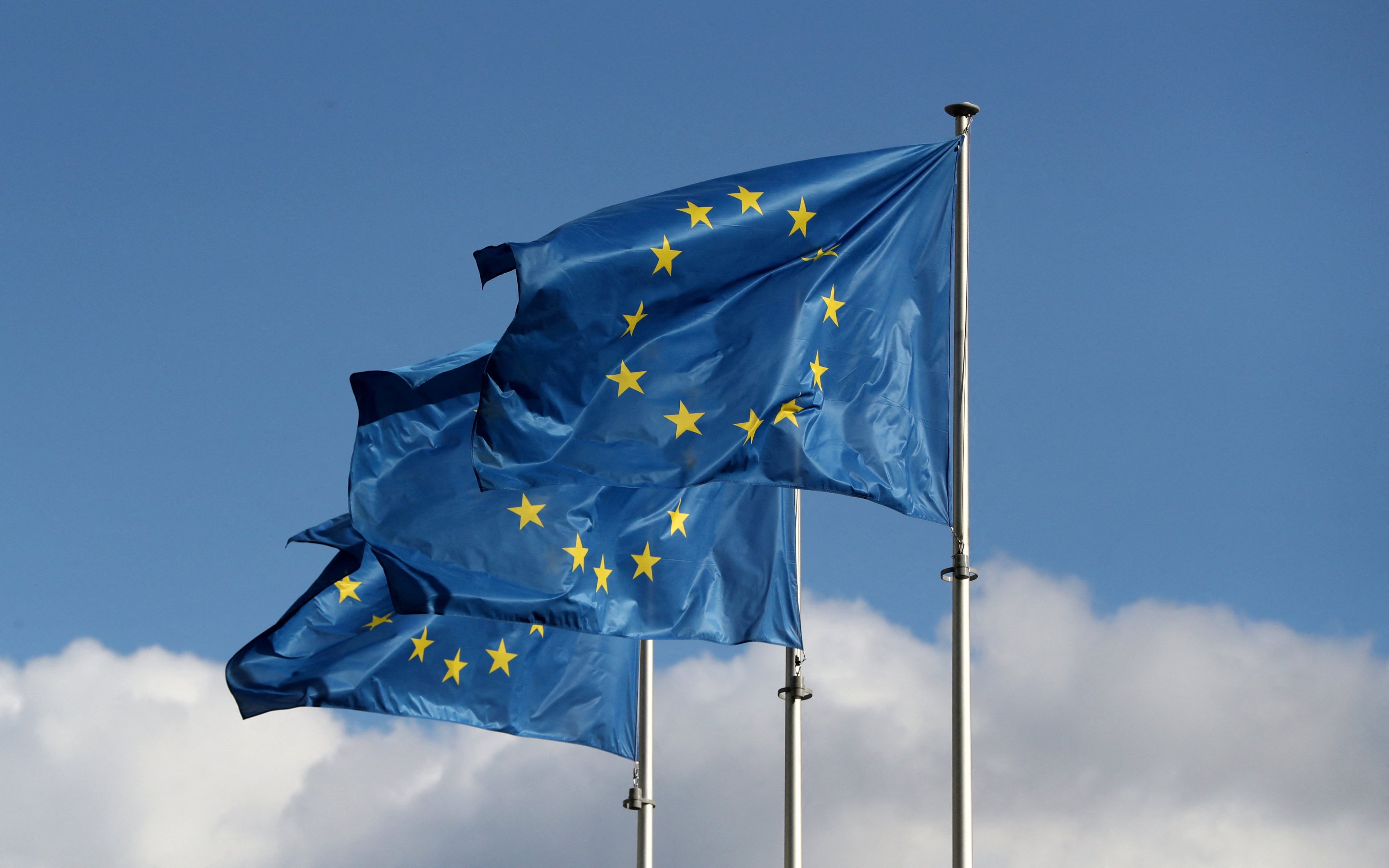 EU flags flutter outside the European Commission headquarters in Brussels. The bloc aims to use its existing economic tools more aggressively and with overall resilience objectives in mind. Photo: Reuters