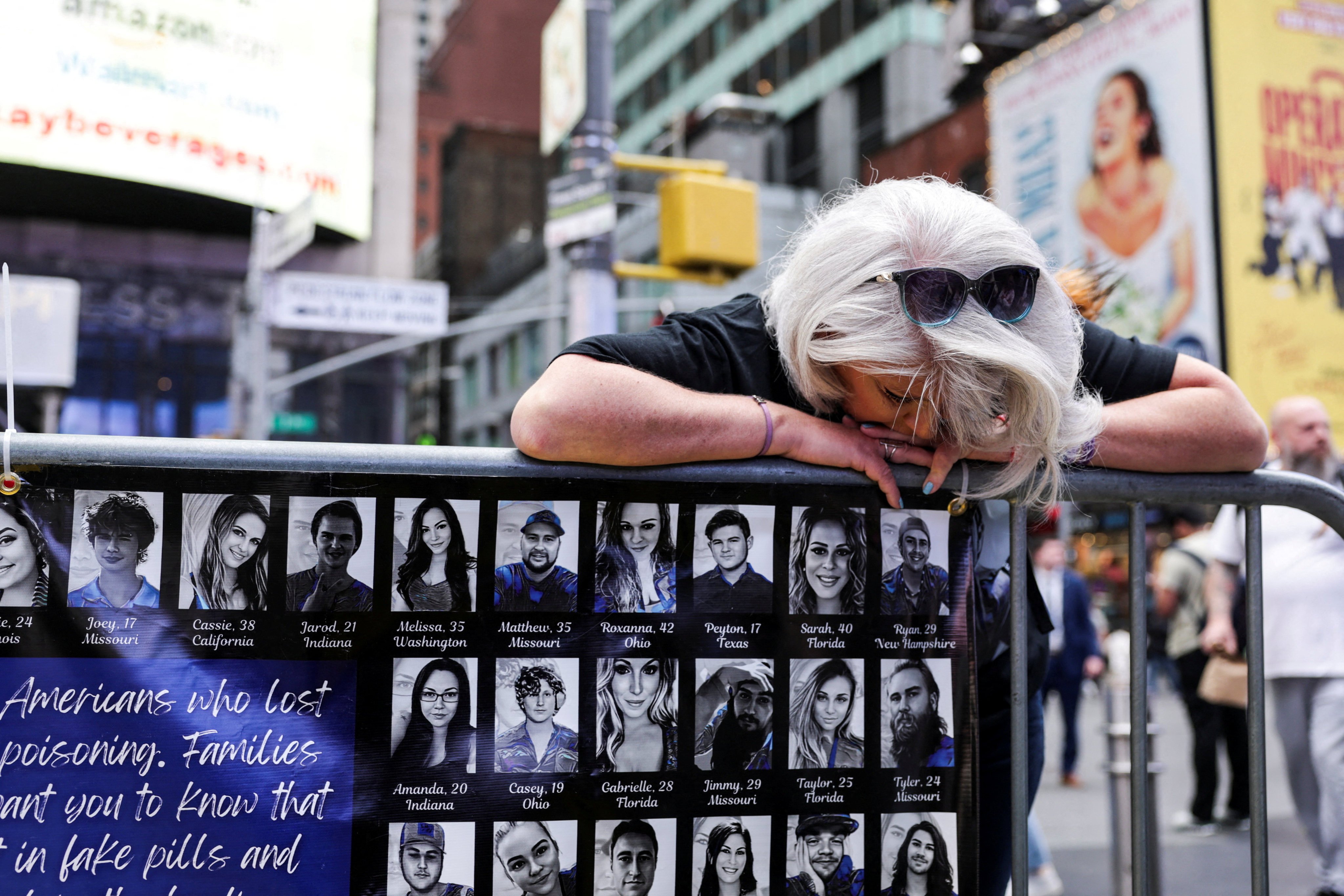 Tricia Theriault, from New Hampshire, reacts during the Fourth Annual National Fentanyl Prevention and Awareness Day event in Times Square, New York City, US, on August 21. Photo: Reuters