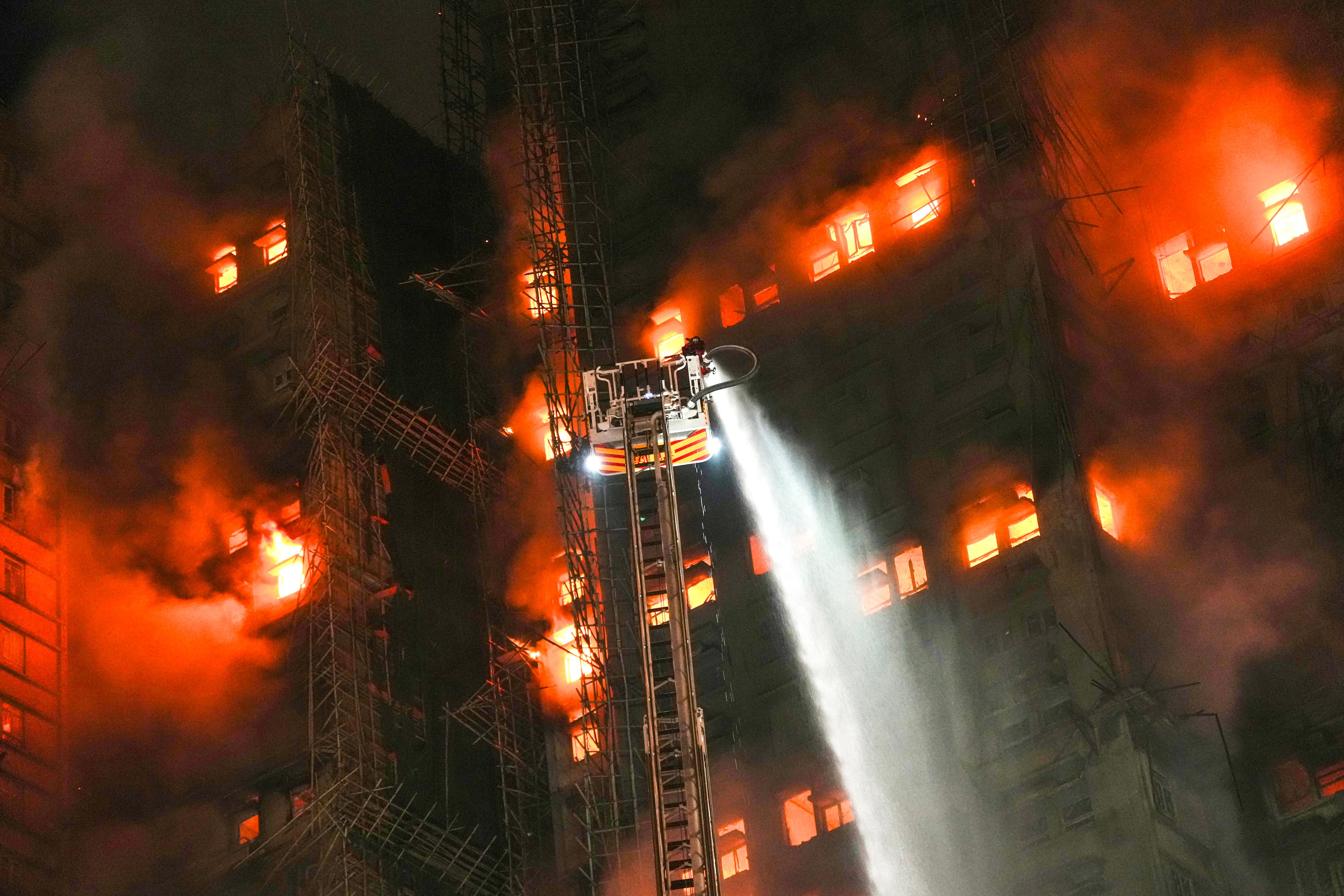 Firefighters battle the blaze at Wang Fuk Court. Flames spread from one tower to another six, and many residents reported they had either little or no warning of the danger. Photo: Karma Lo