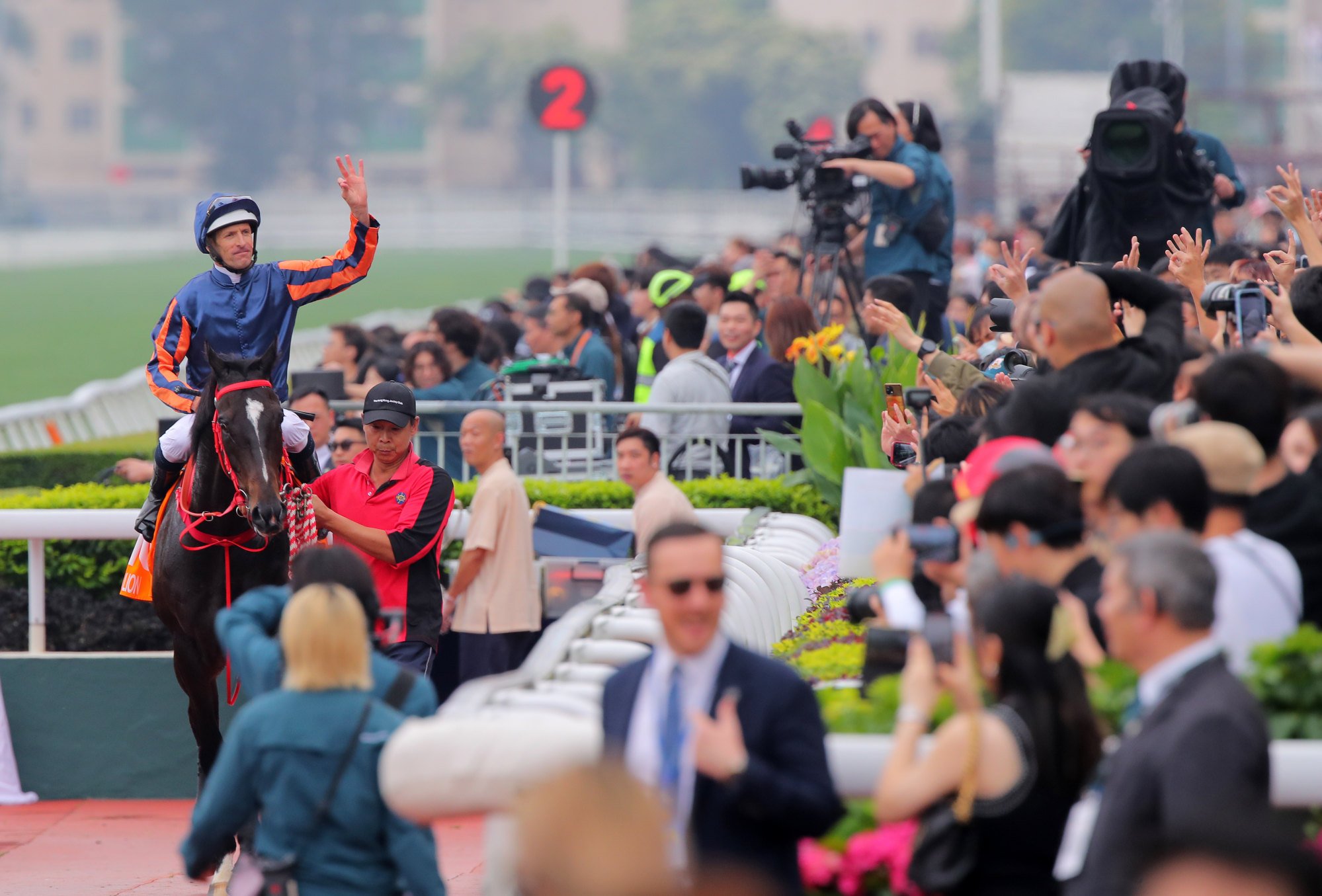 Hugh Bowman salutes the crowd after guiding Red Lion to an upset win in April’s Group One Champions Mile. Hugh Bowman salutes the crowd after guiding Red Lion to an upset win in April’s Group One Champions Mile.
