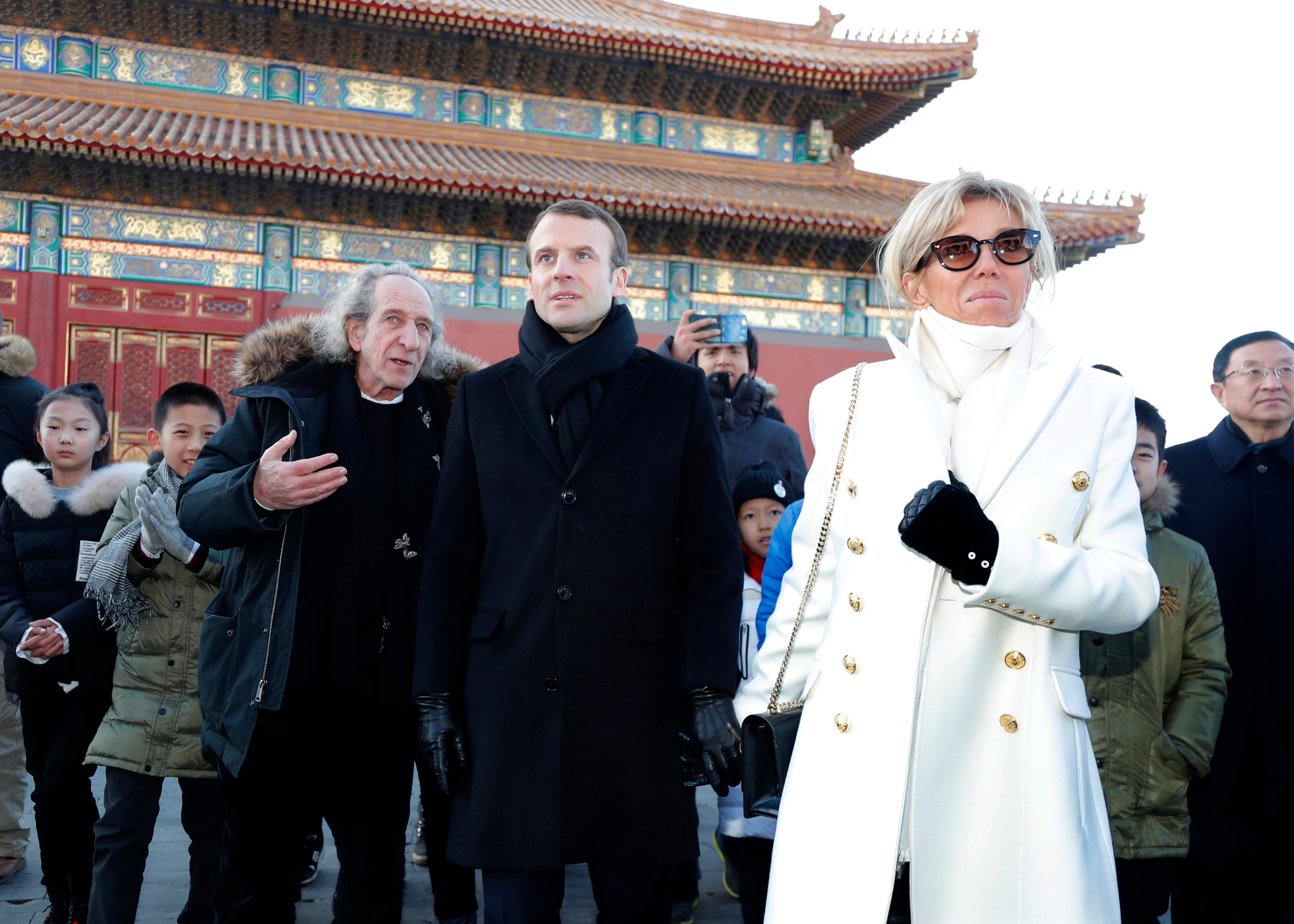 French President Emmanuel Macron and his wife, Brigitte Macron, visit the Forbidden City. Photo: AP/Pool