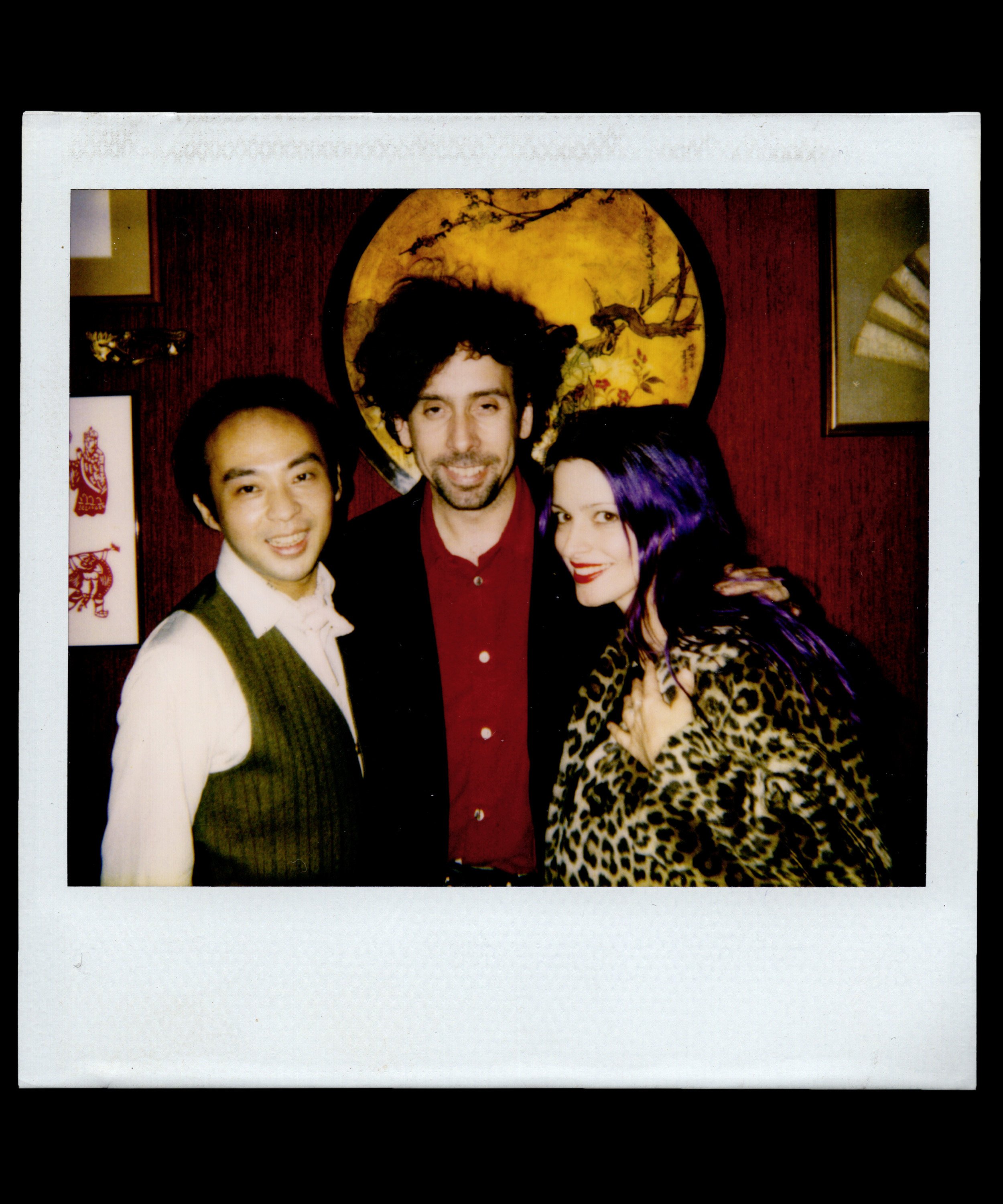 (From left) Tai “Davé“ Cheung, US filmmaker Tim Burton and Lisa Marie Presley are pictured at Davé, a legendary Chinese restaurant in Paris, France that saw celebrities including Madonna, Leonardo DiCaprio, Cameron Diaz, Keanu Reeves, David Bowie, Tina Turner, Janet Jackson, Yves Saint Laurent and Tom Ford dine there.