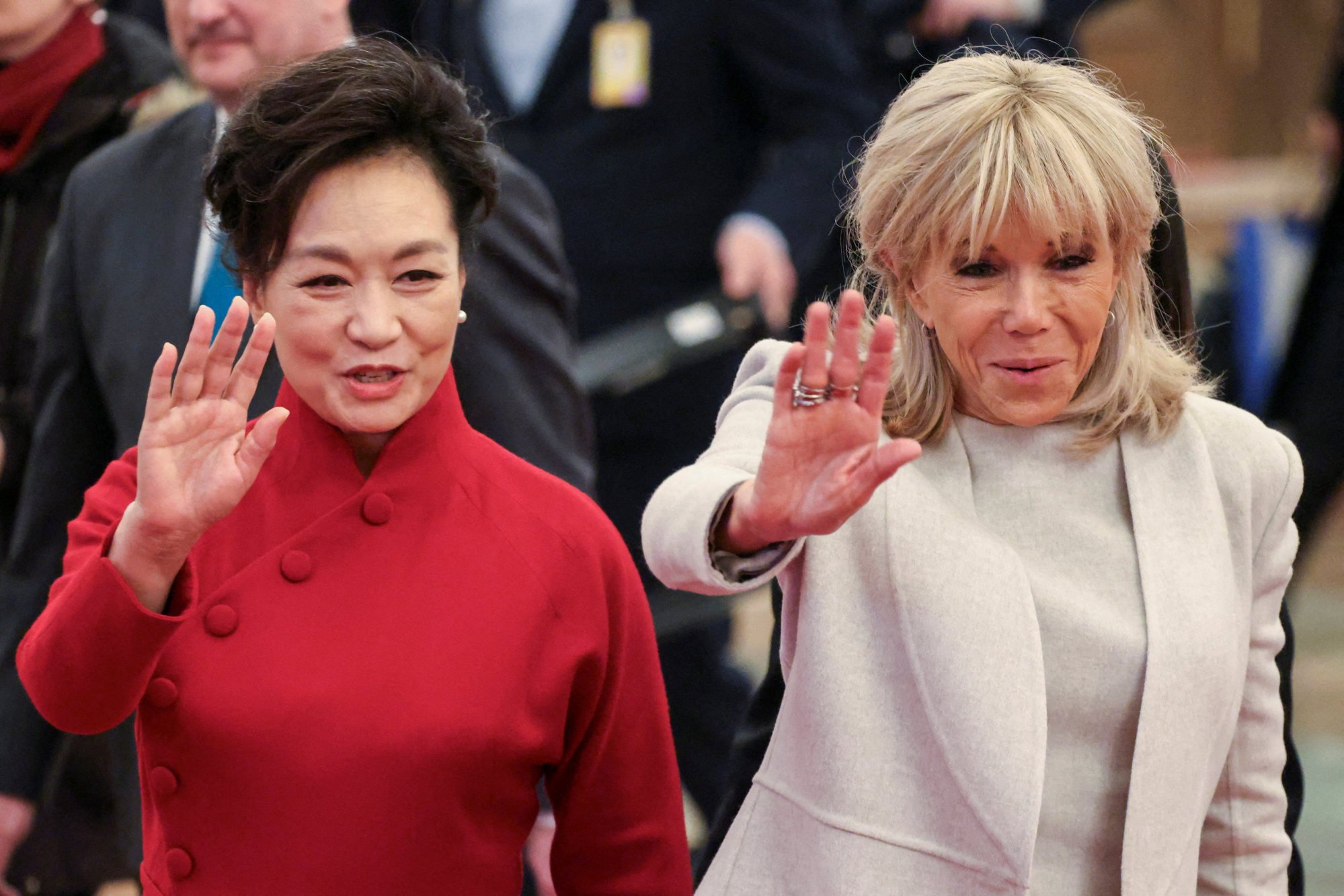 Chinese and French first ladies Peng Liyuan and Brigitte Macron pictured at Thursday’s welcome ceremony. Photo: Reuters
