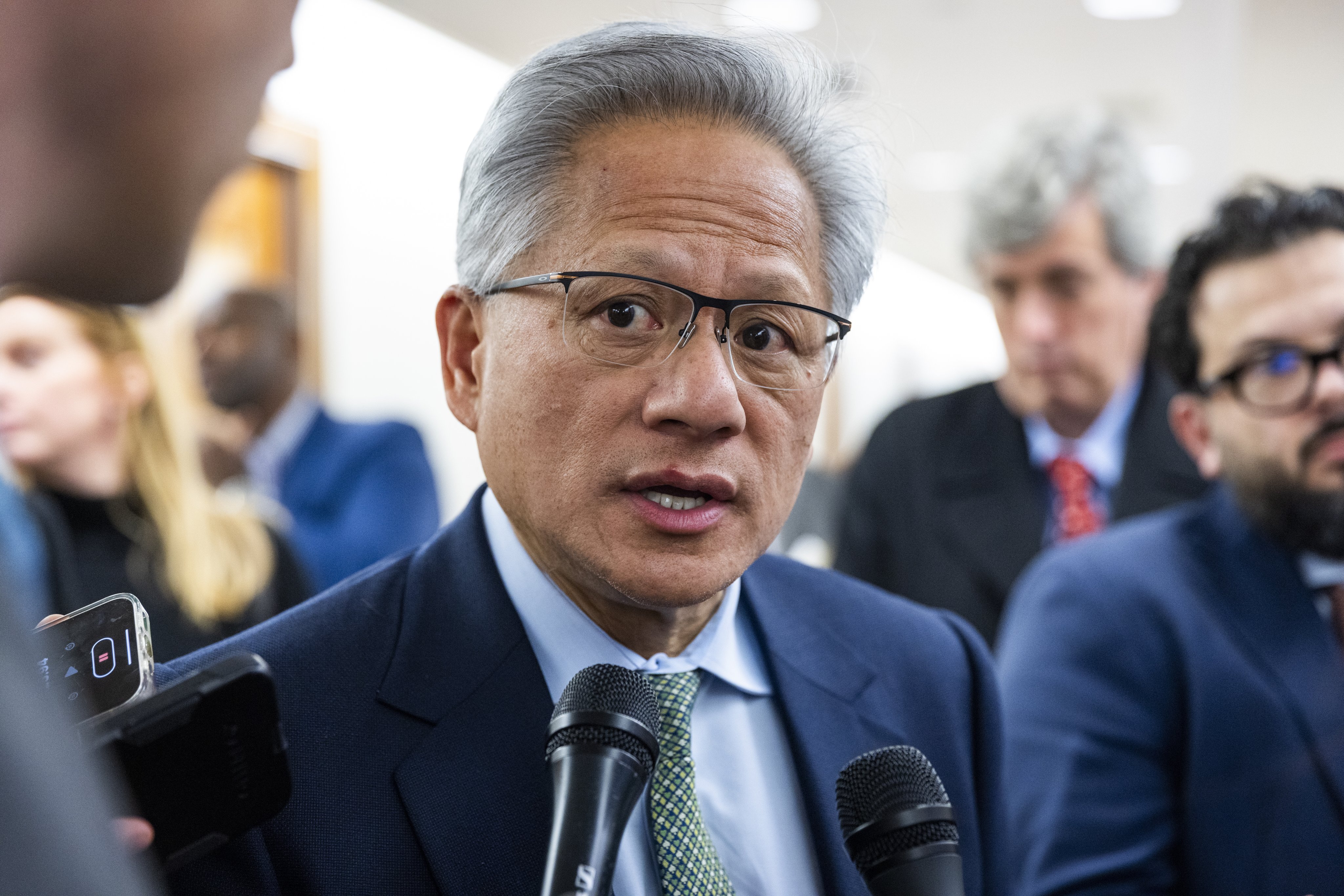 Nvidia CEO Jensen Huang speaks briefly to reporters in Washington on Wednesday. Photo: EPA