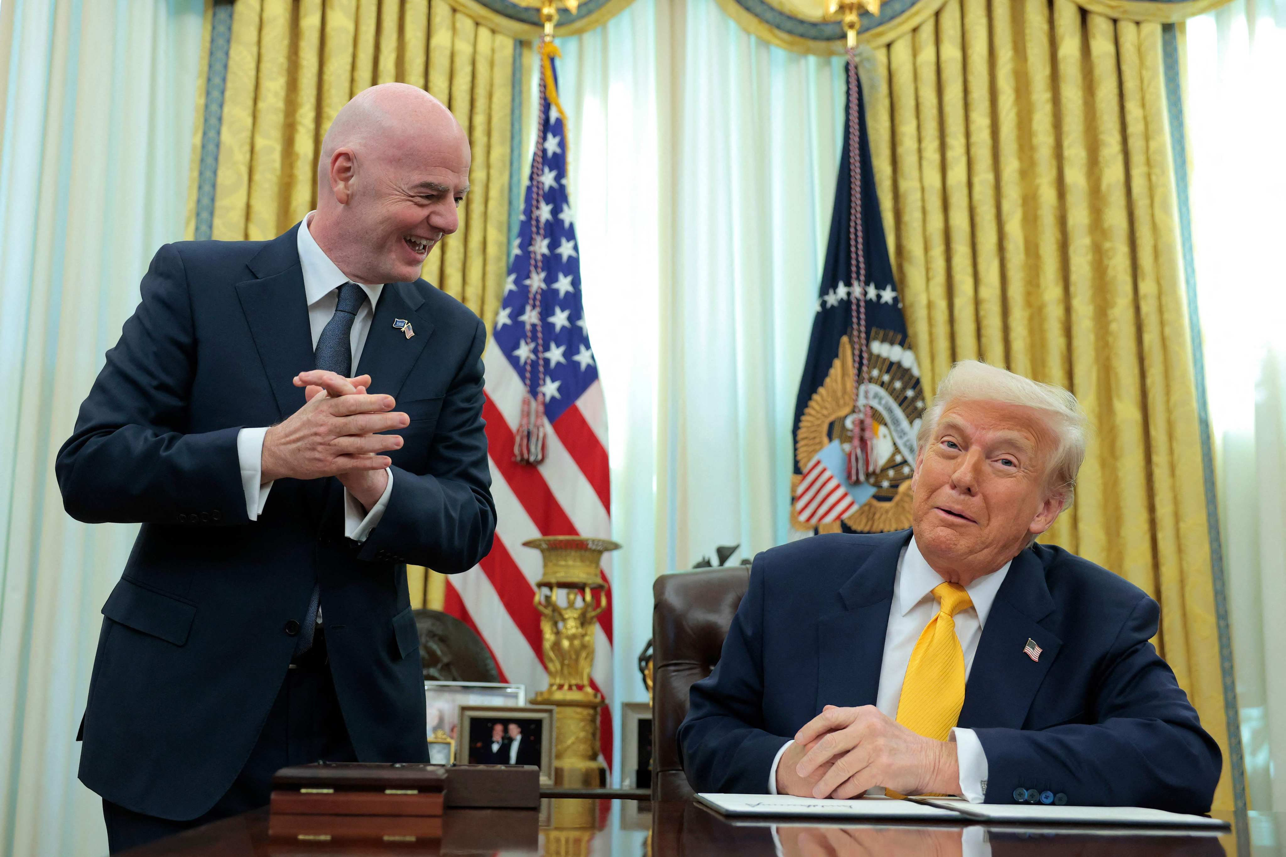 Fifa president Gianni Infantino (left) speaks alongside US President Donald Trump at the White House in March. Photo: AFP