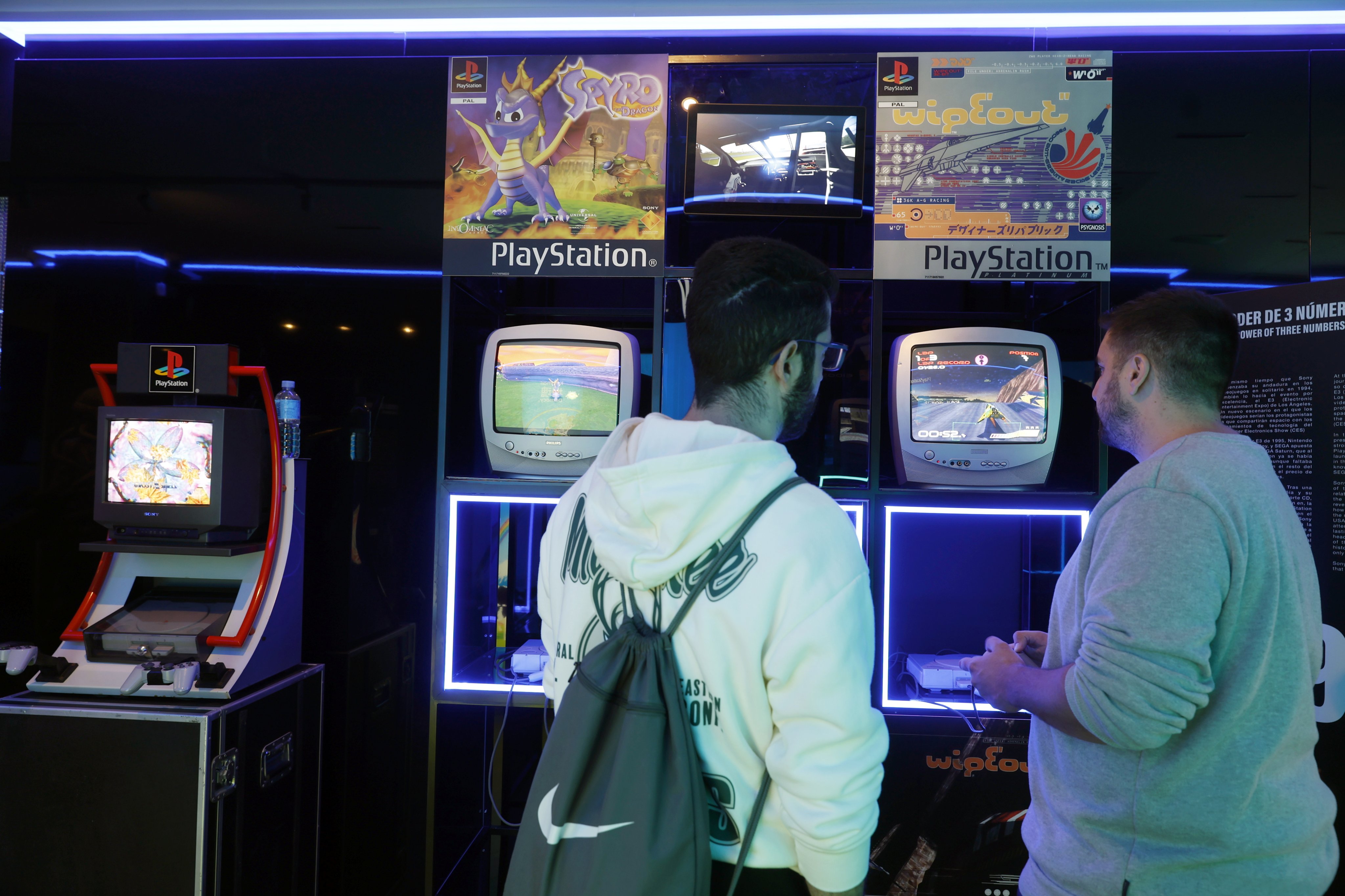 People play Wipeout at an exhibition tracing 30 years of the PlayStation console at the OXO Video Game Museum in Malaga, Spain, on November 13, 2025. Photo: EPA