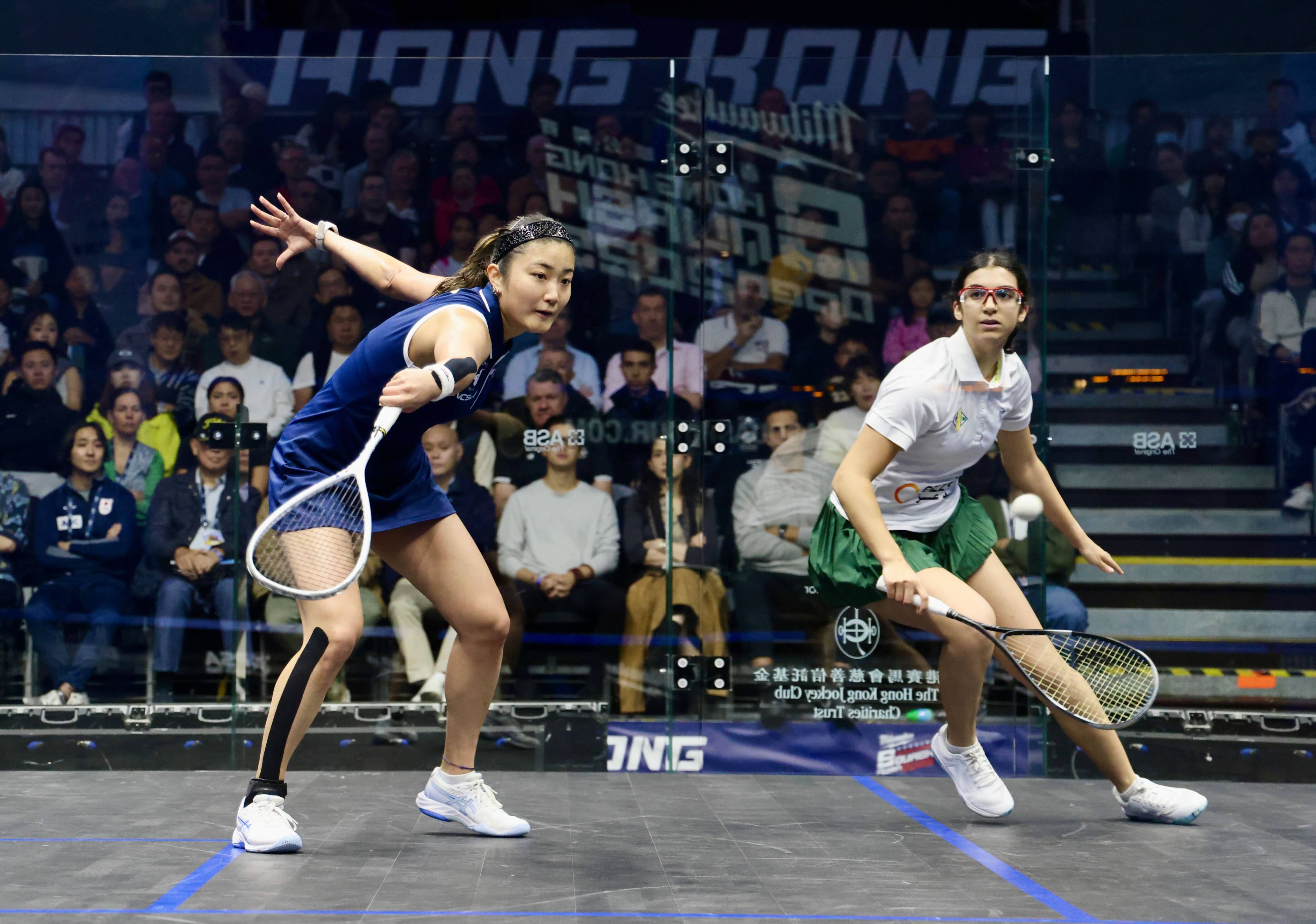 Satomi Watanabe (left) tries to wrongfoot Amina Orfi during a thrilling Hong Kong Open quarter-final. Photo: Jonathan Wong