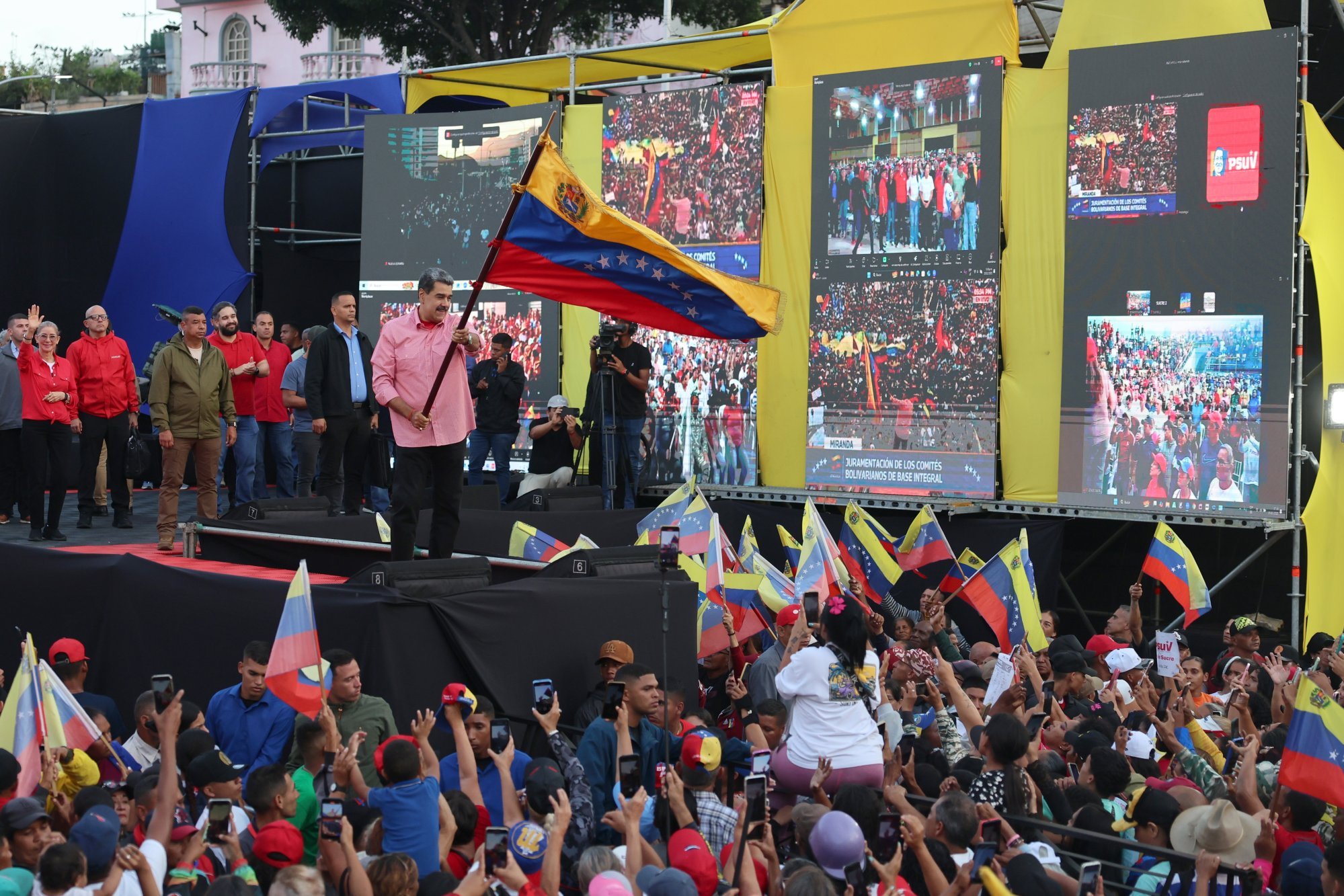 Venezuelan President Nicolas Maduro waves a Venezuelan flag during an event in Caracas, in November. Maduro sang John Lennon’s iconic song “Imagine” during a ceremony amid growing tensions with the United States. Photo: EPA Venezuelan President Nicolas Maduro waves a Venezuelan flag during an event in Caracas, in November. Maduro sang John Lennon’s iconic song “Imagine” during a ceremony amid growing tensions with the United States. Photo: EPA
