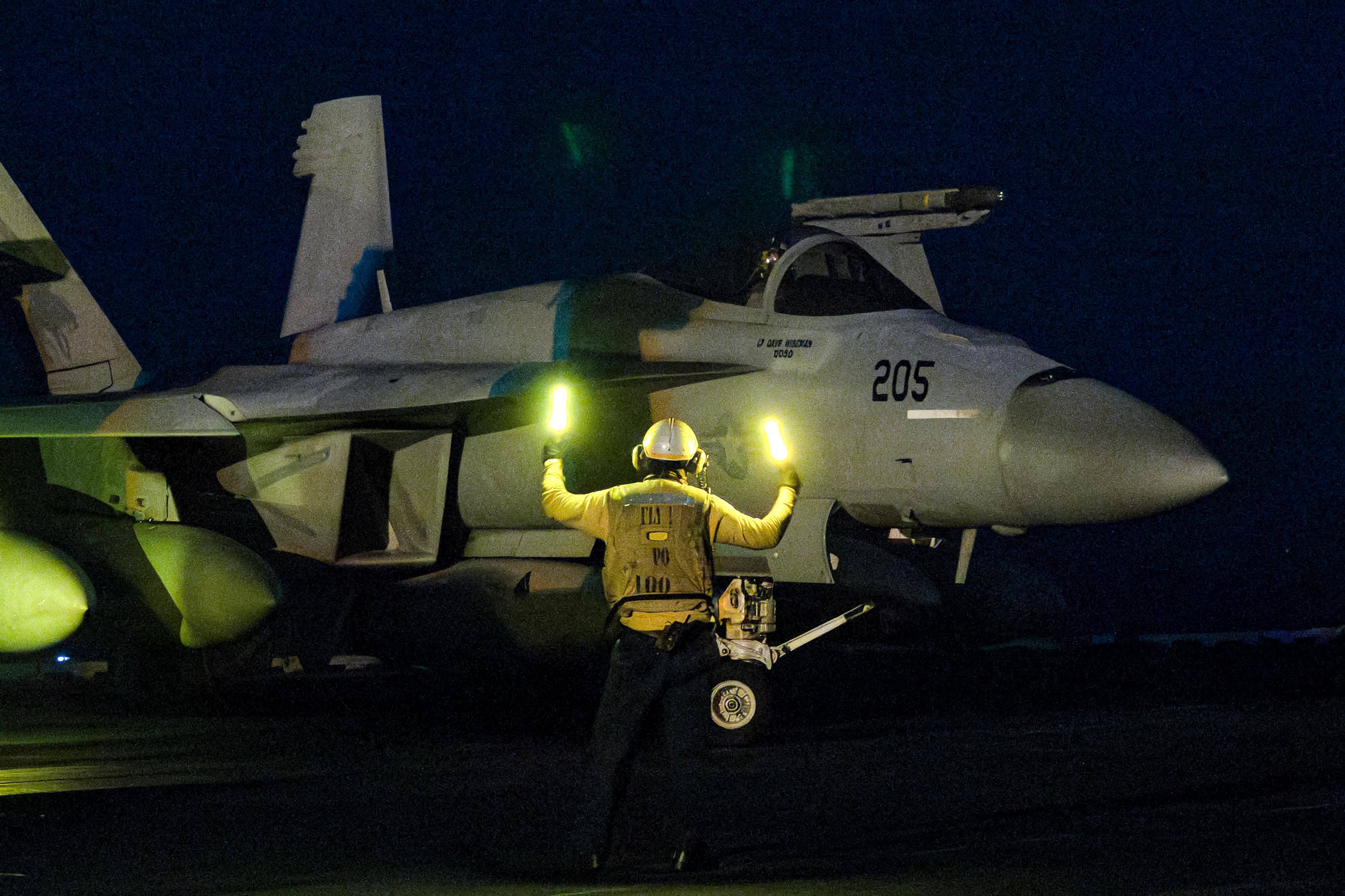 A F/A-18 Super Hornet fighter jet preparing for launch from the USS Harry S. Truman aircraft carrier on March 16, 2025. Photo: US Navy via AFP