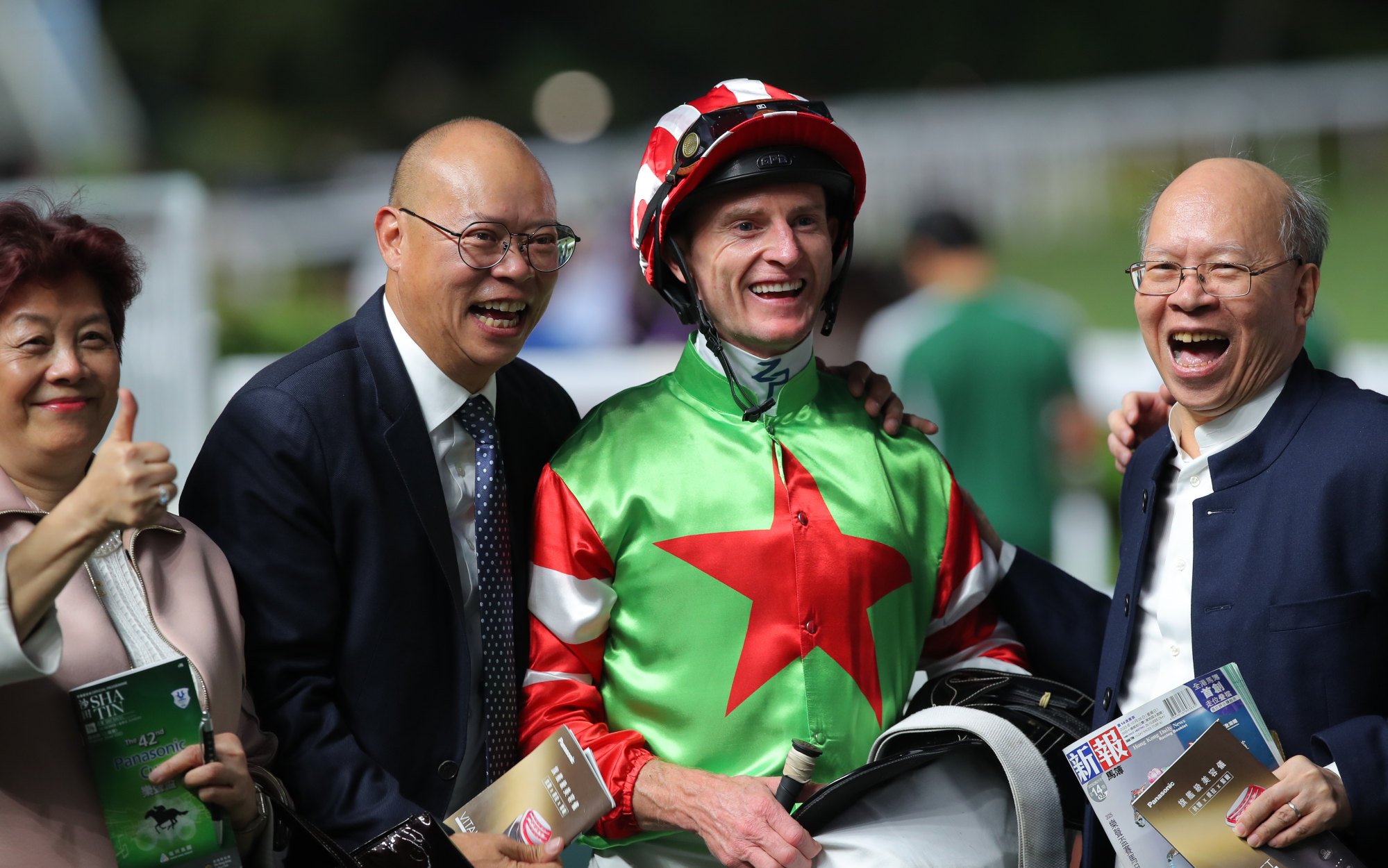 Trainer Chris So (second from left), jockey Zac Purton and connections of Top Dragon after his latest success.