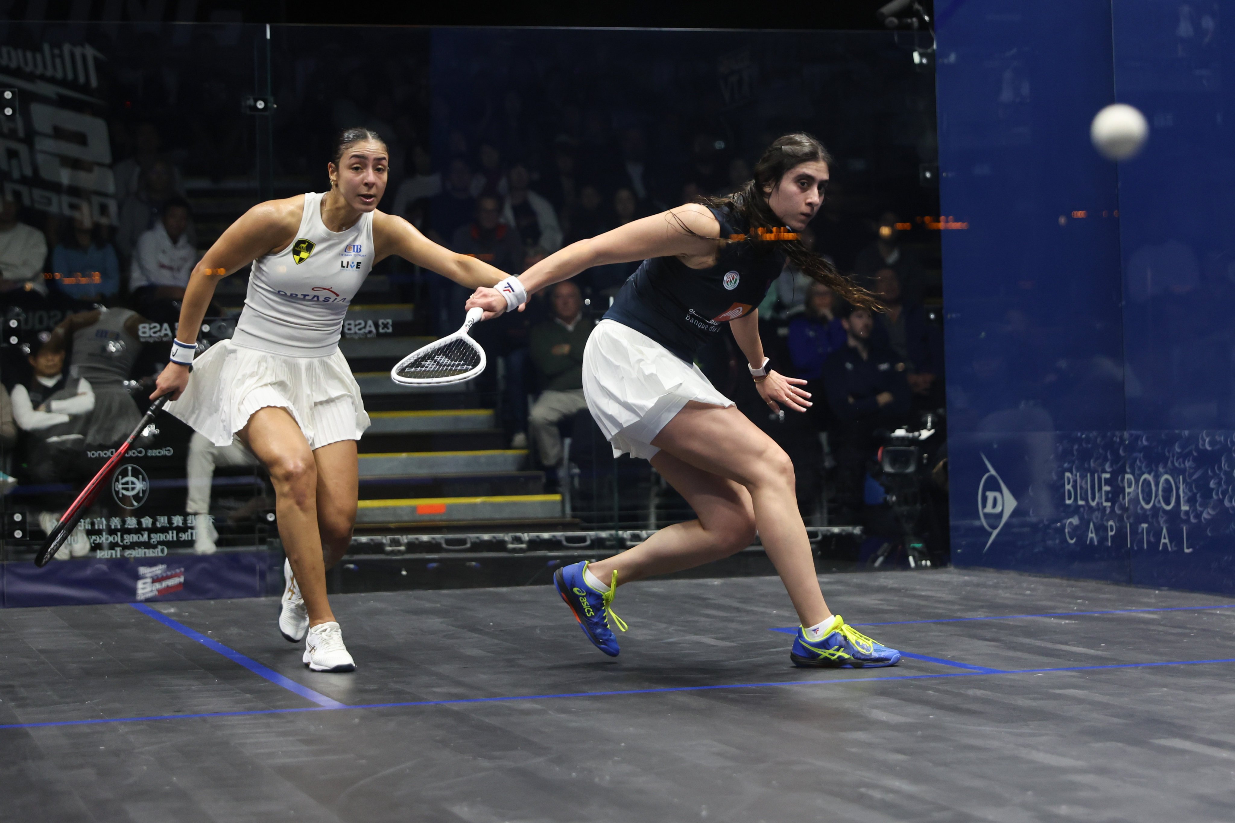 Nour El Sherbini (black top) and Hania El Hammamy in action during the semi-final. Photo: Edmond So