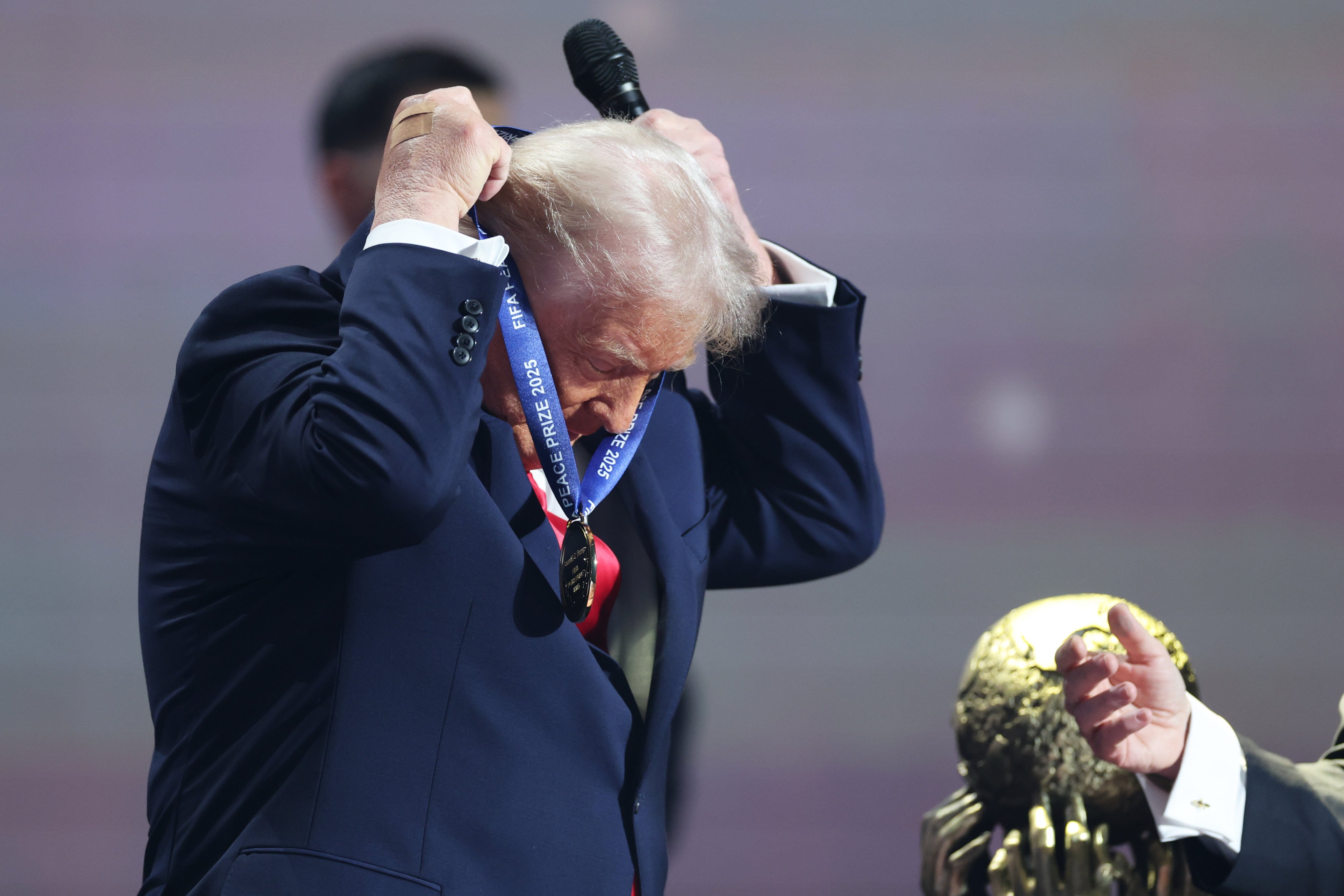 US President Donald Trump is awarded the Fifa Peace Prize in Washington on Friday. Photo: AP