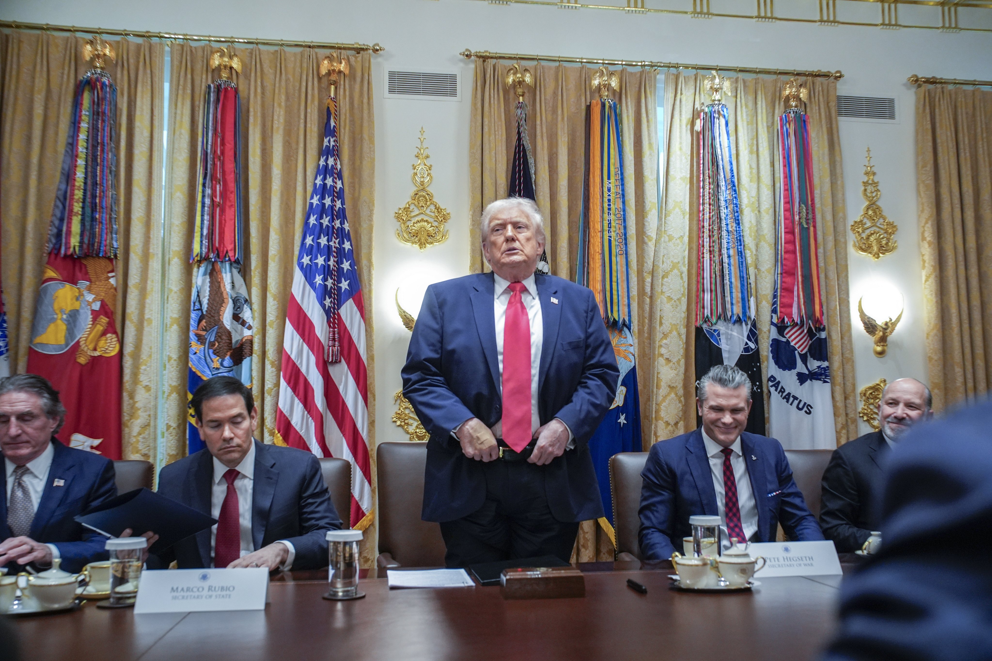 US President Donald Trump stands during a cabinet meeting at the White House on Tuesday. Photo: EPA
