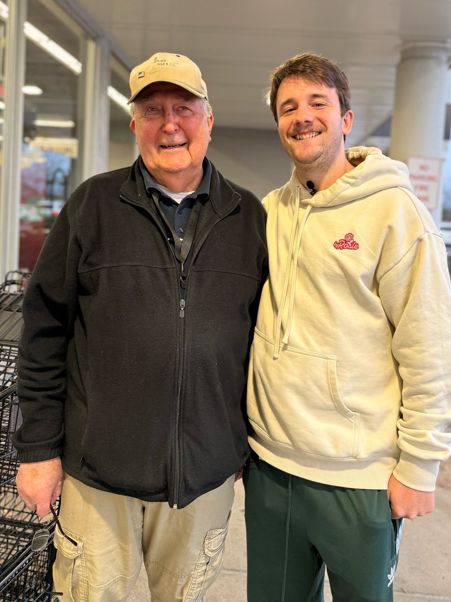 Australian influencer Sam Weidenhofer (right) with 88-year-old US supermarket worker Ed Bambas from Michigan. Photo: Instagram/itssozer