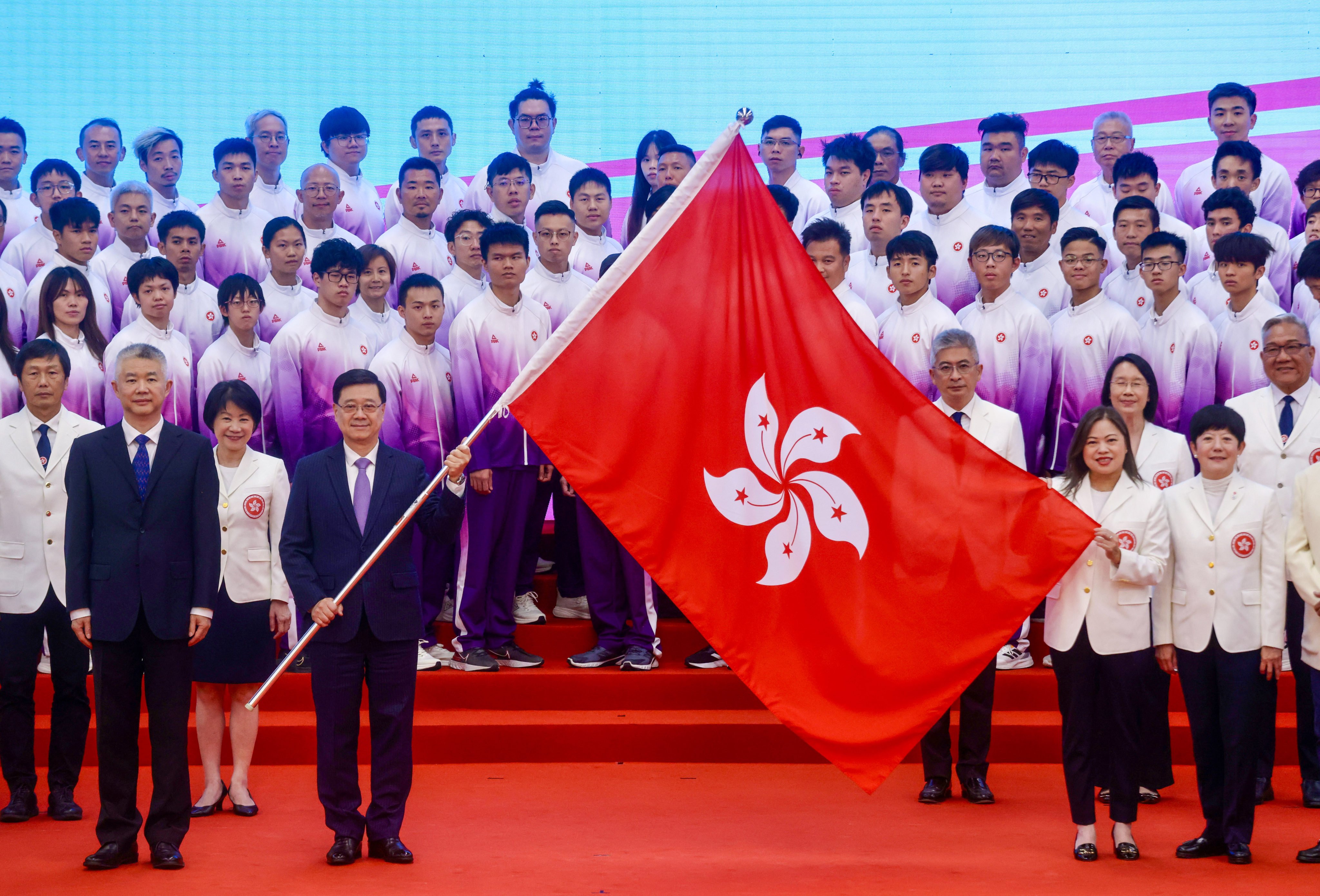Chief Executive John Lee and Secretary for Culture, Sports and Tourism Rosanna Law attend the Flag Presentation Ceremony of the HKSAR Delegation to the 12th National Paralympic Games for Persons with Disabilities and the 9th National Special Olympic Games of the People’s Republic of China, on 24 November. Photo: Jonathan Wong