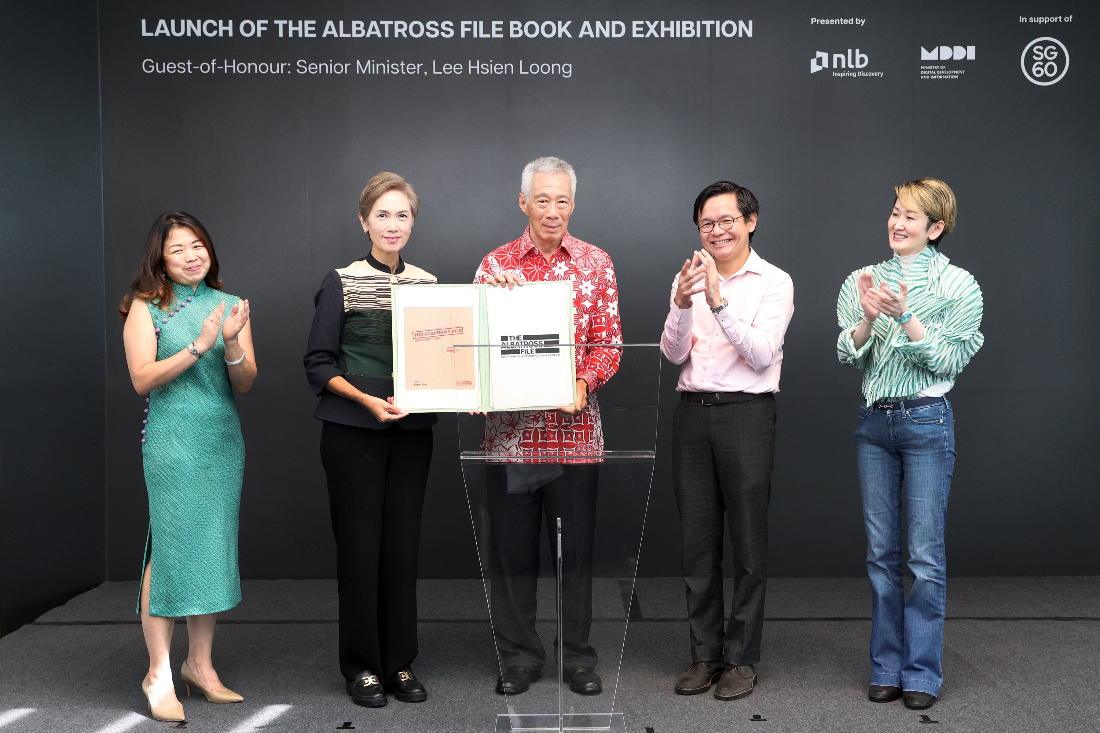 Singapore’s former prime minister Lee Hsien Loong (centre) launches “The Albatross File: Inside Separation” book on Sunday. Photo: Ministry of Digital Development and Information