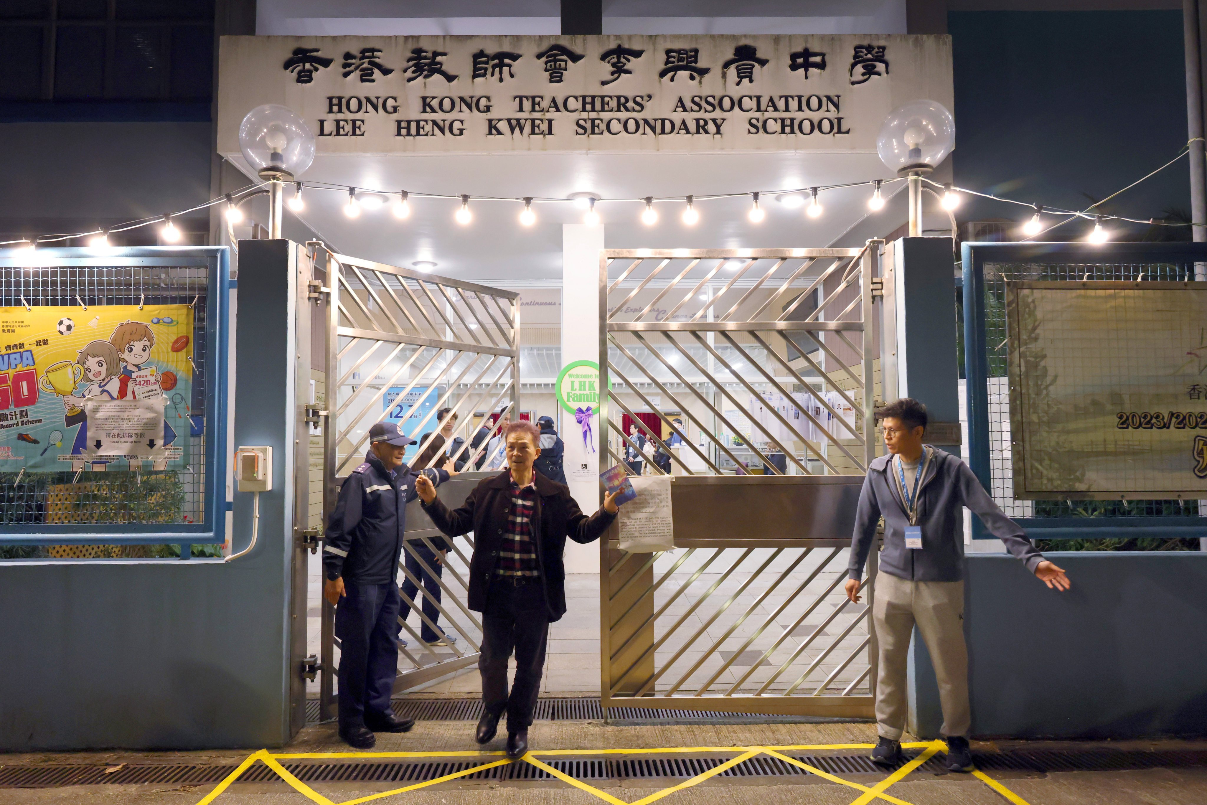 Voter Sunny Leung entered the polling station in Tai Po just one minute before voting ended. Photo: Jelly Tse