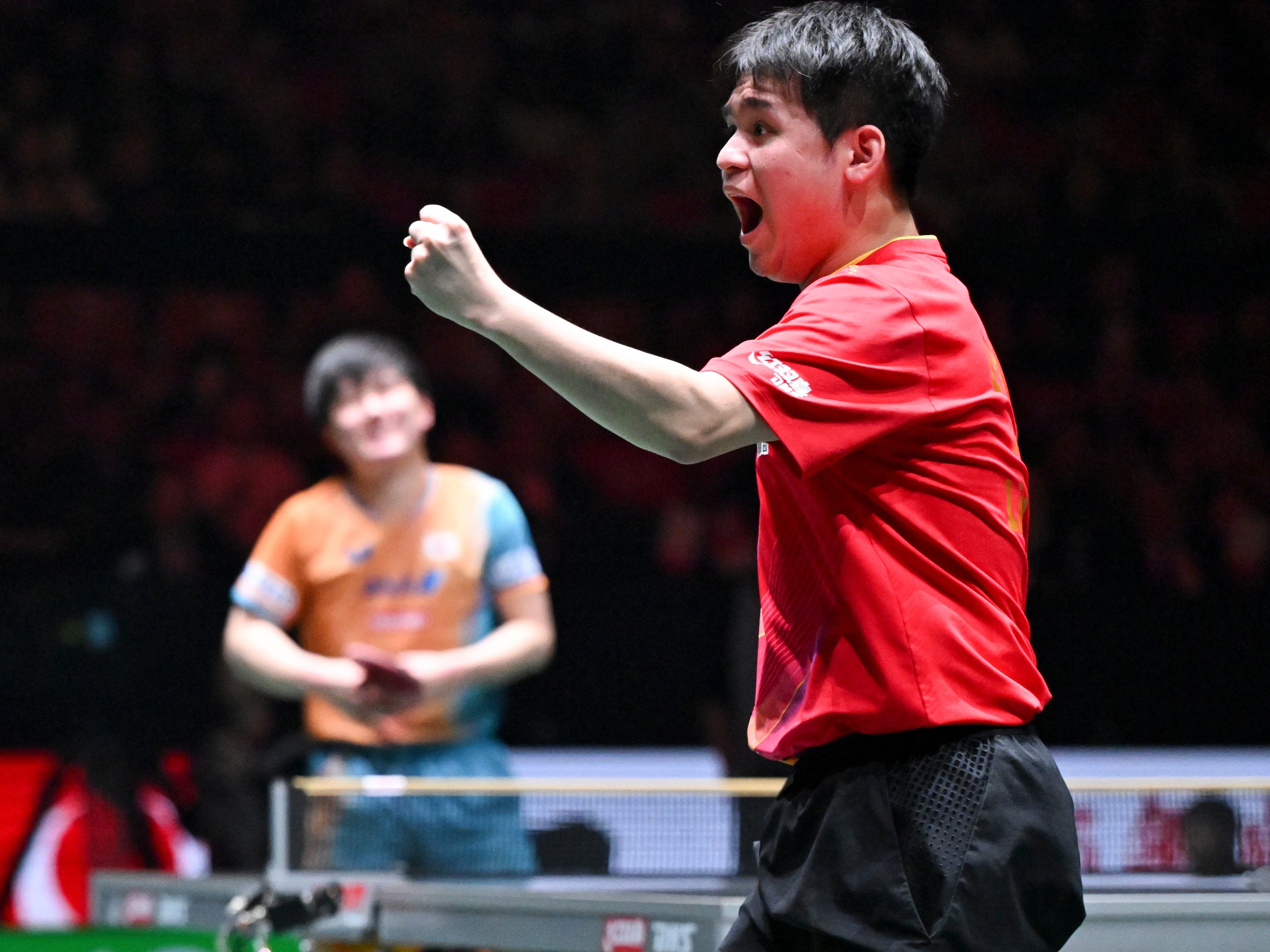 Lin Shidong’s victory over of Harimoto Tomokazu sealed China’s third ITTF Mixed Team World Cup title. Photo: Xinhua