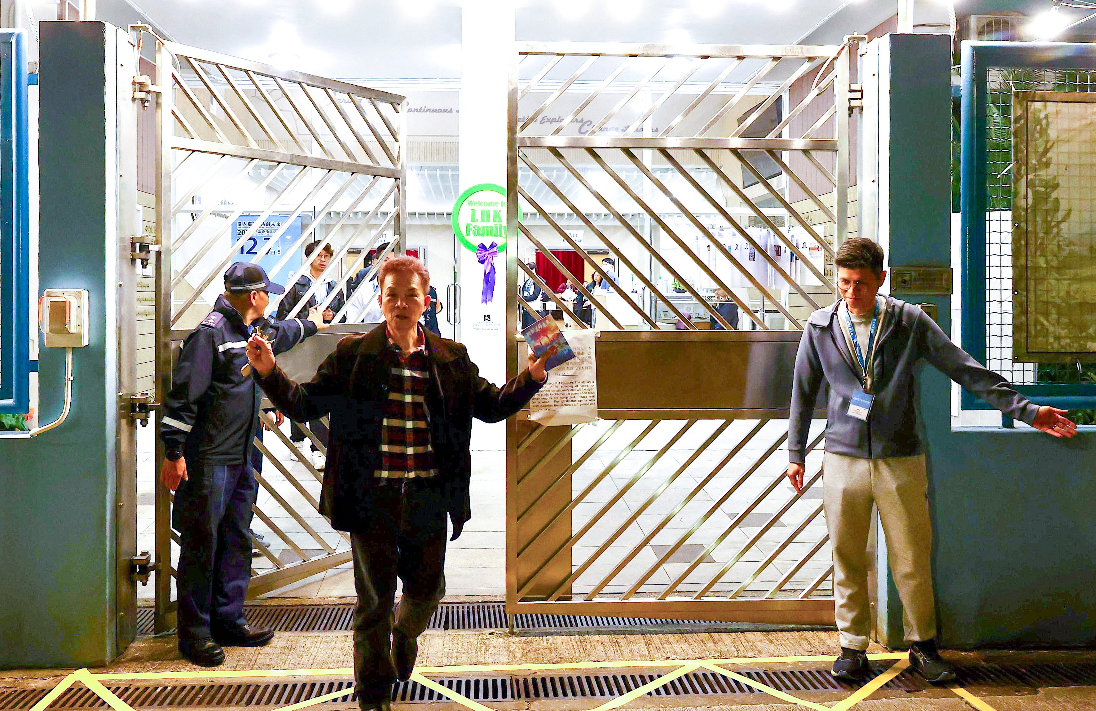 Voter Sunny Leung entered the polling station in Tai Po just one minute before voting ended. Photo: Jelly Tse