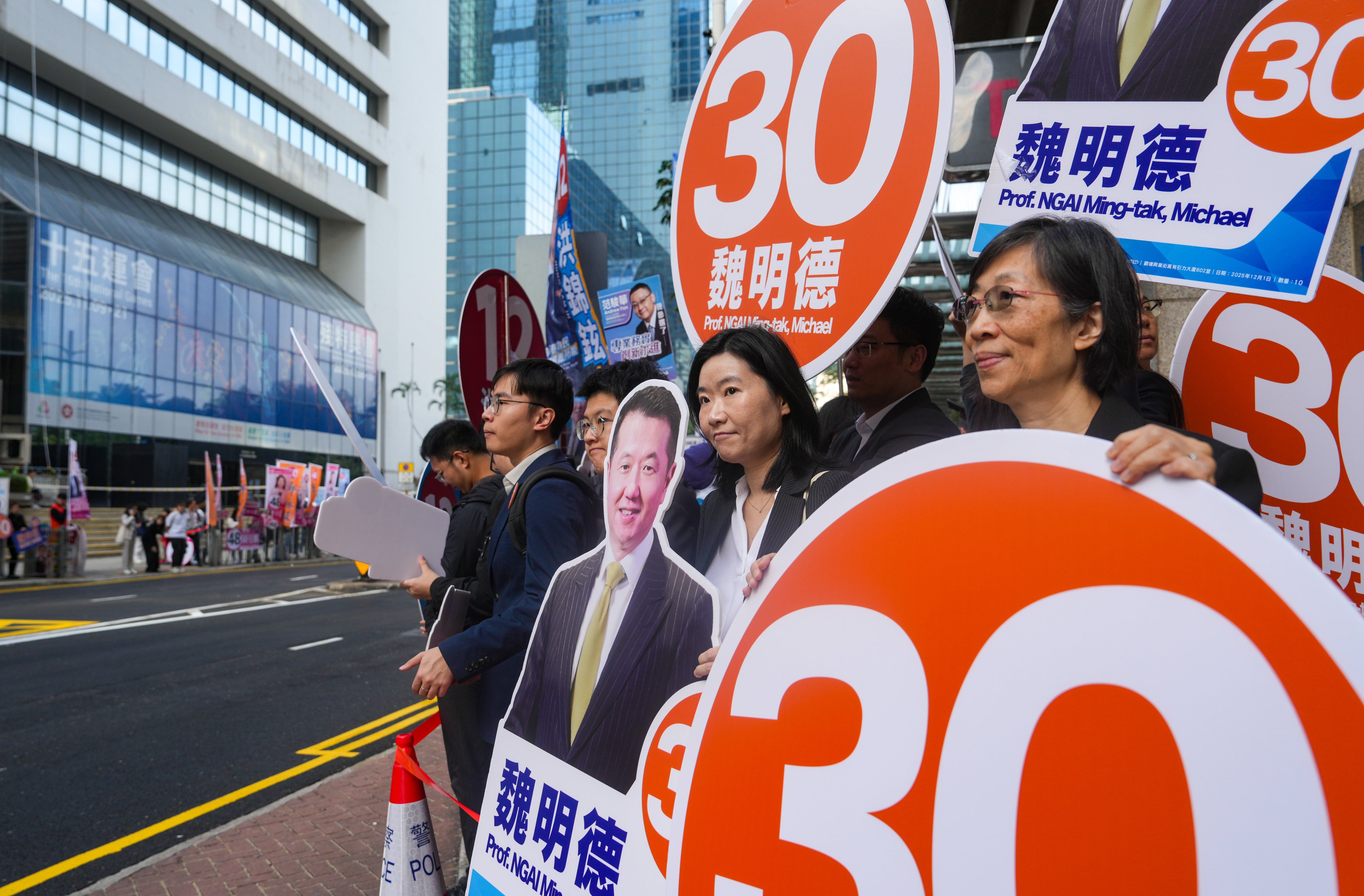 Supporters gather outside the Election Committee Constituency Polling Station at HKCEC in Wan Chai. Photo: Sam Tsang