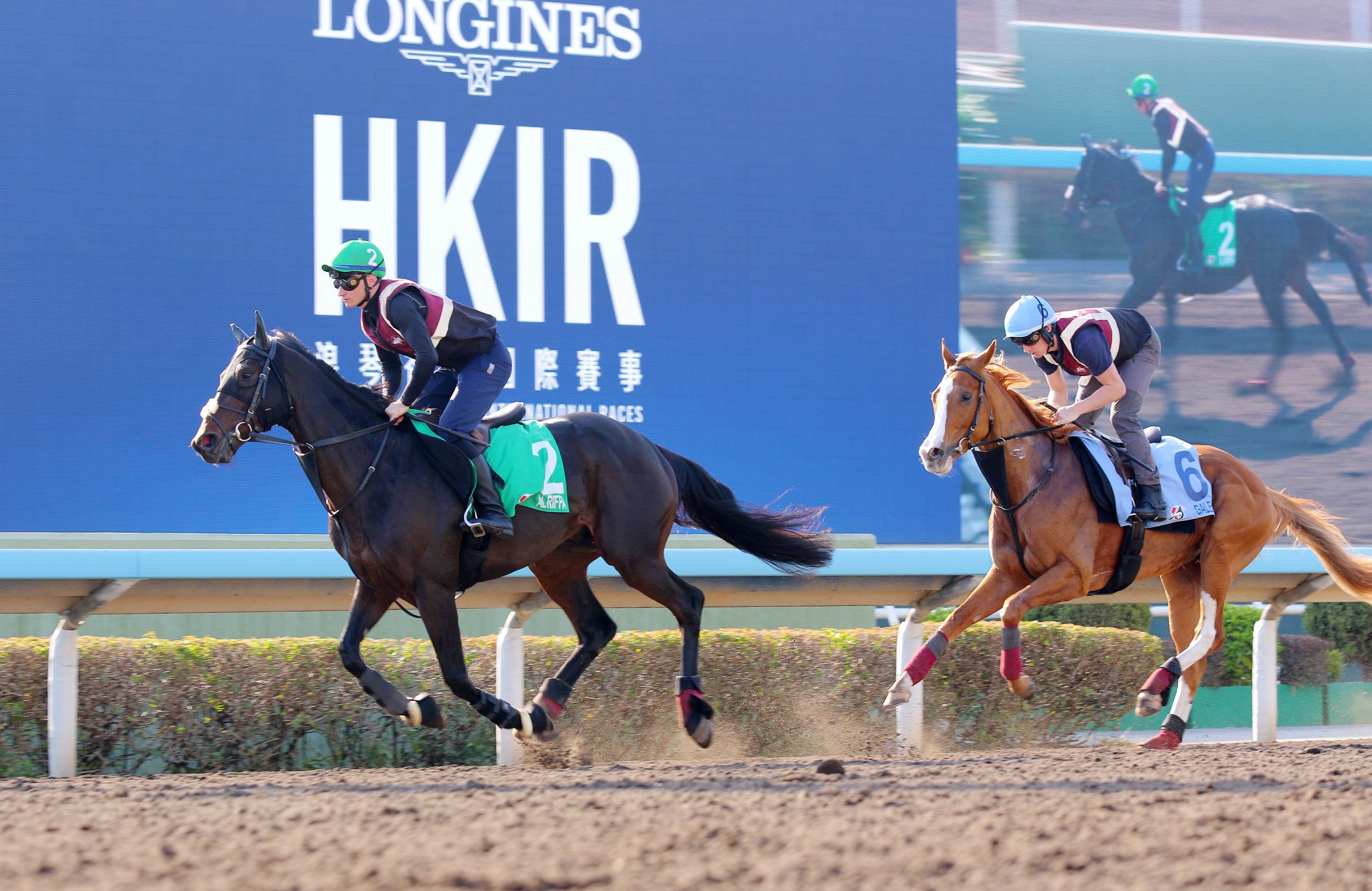 Al Riffa (left) and Galen gallop at Sha Tin.