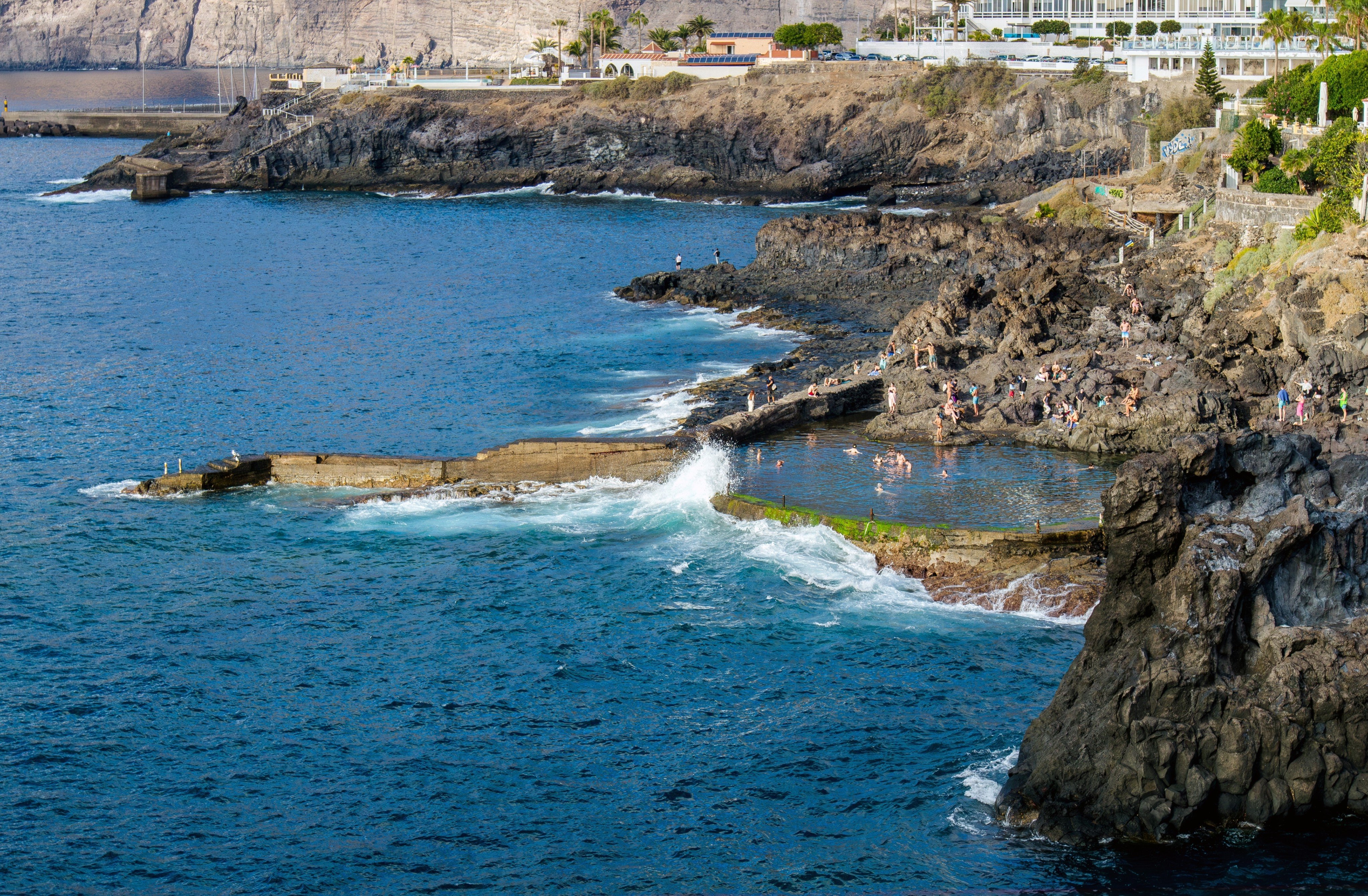 People swimming at Isla Cangrejo on Tenerife’s Los Gigantes coast. File photo: Shutterstock