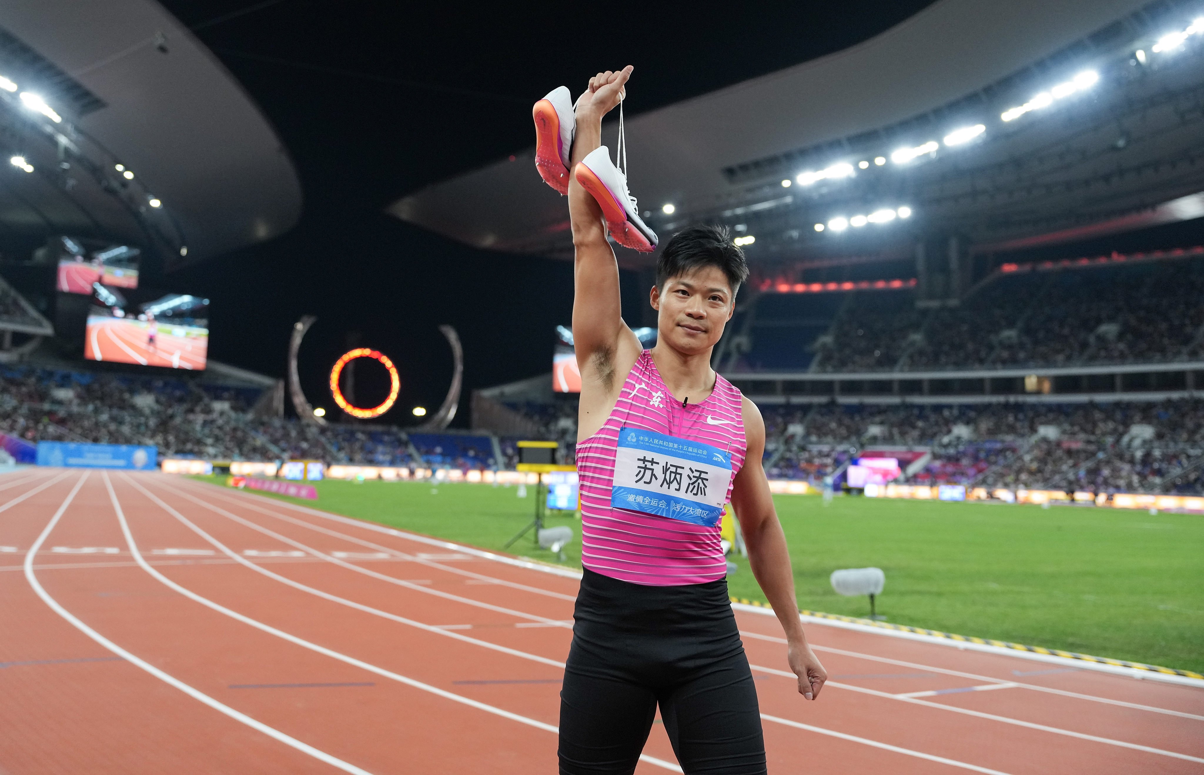 Su Bingtian after running for Guangdong in the 4x100m relay final at the National Games in Guangzhou last month. Photo: Xinhua