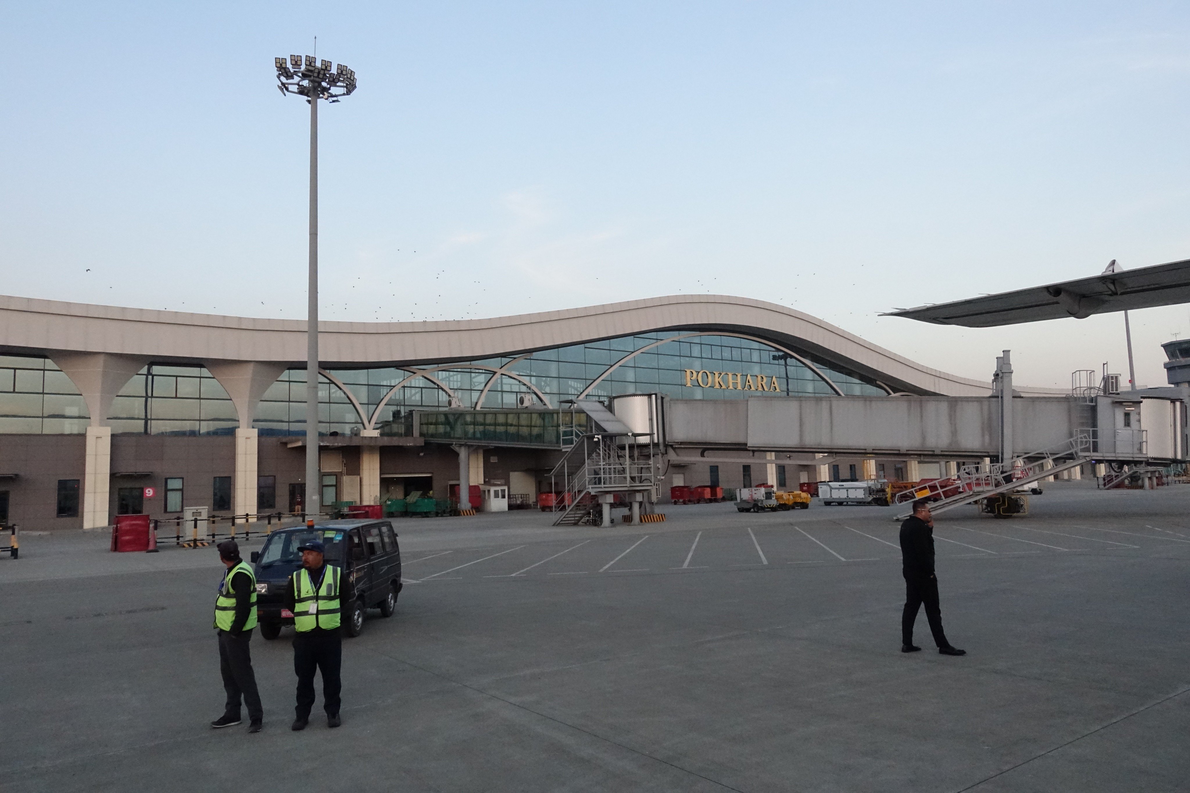 Staff members wait for the arrival of passengers at Pokhara International Airport in December last year. Photo: China News Service/VCG/Getty Images