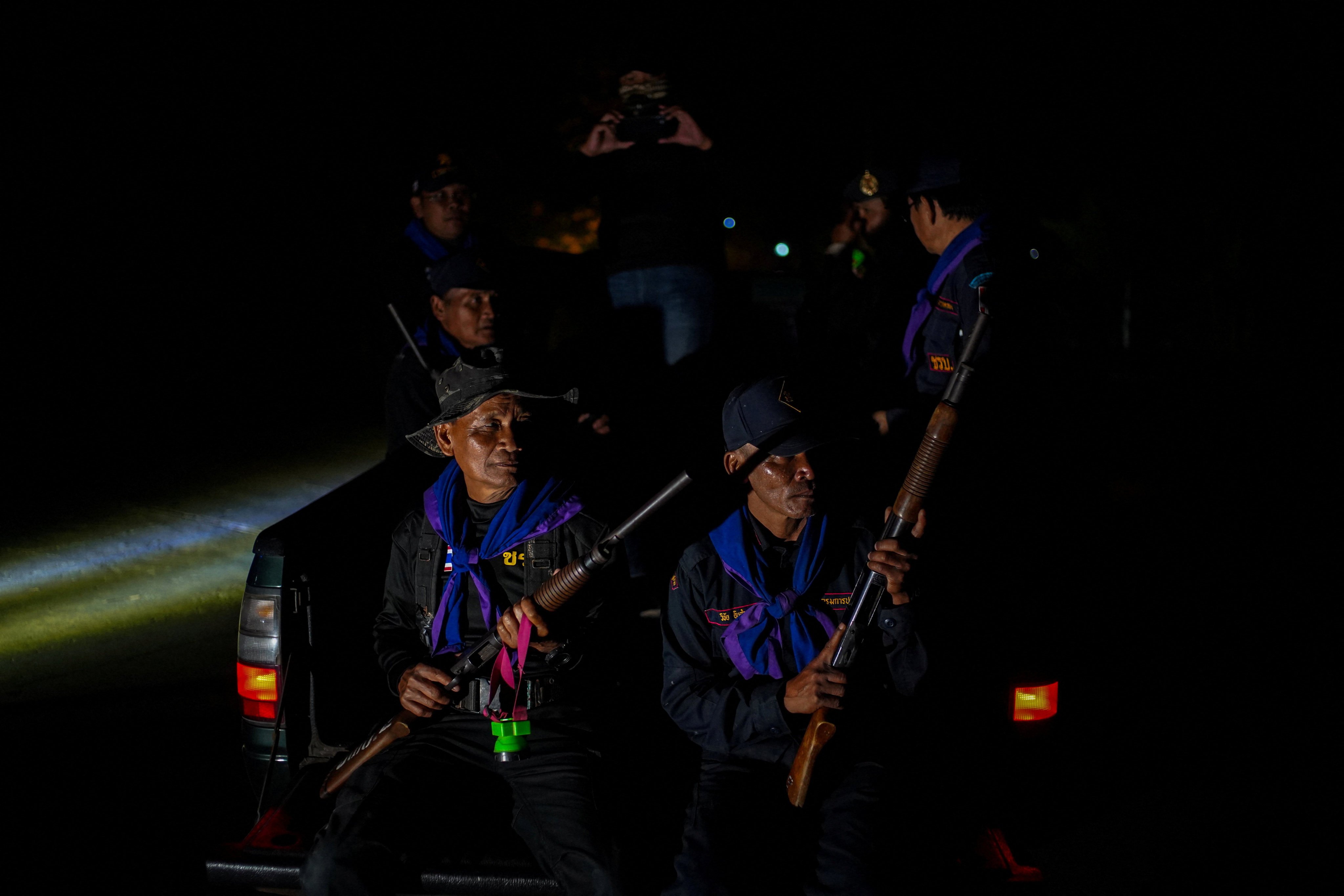 Security volunteers patrol a village in Thailand’s Buriram province on Tuesday. Photo: Reuters