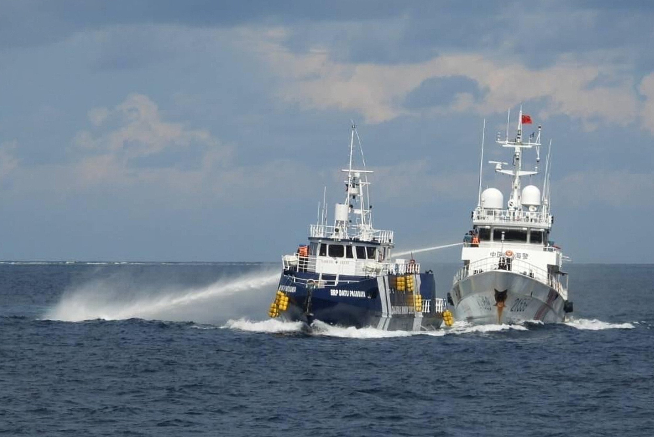 Sun Weidong, Beijing’s vice-minister of foreign affairs tells South China Sea symposium: “It is natural for neighbours to run into problems occasionally, but what is important is to manage differences and resolve disputes”. Photo: Philippine Coast Guard via AP