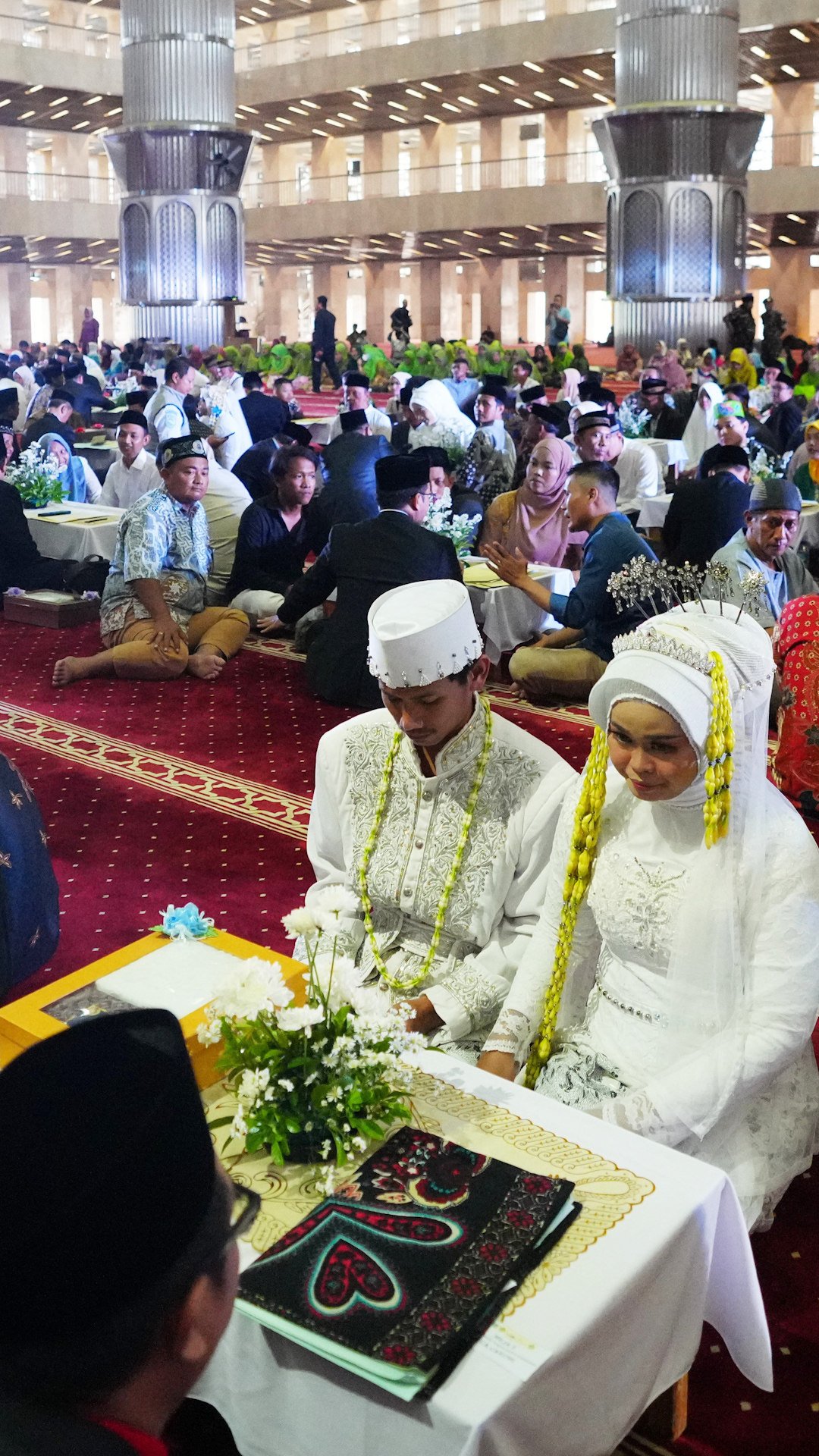 51 couples all said their vows at a mass wedding at Jakarta’s grand mosque. Photo: Handout