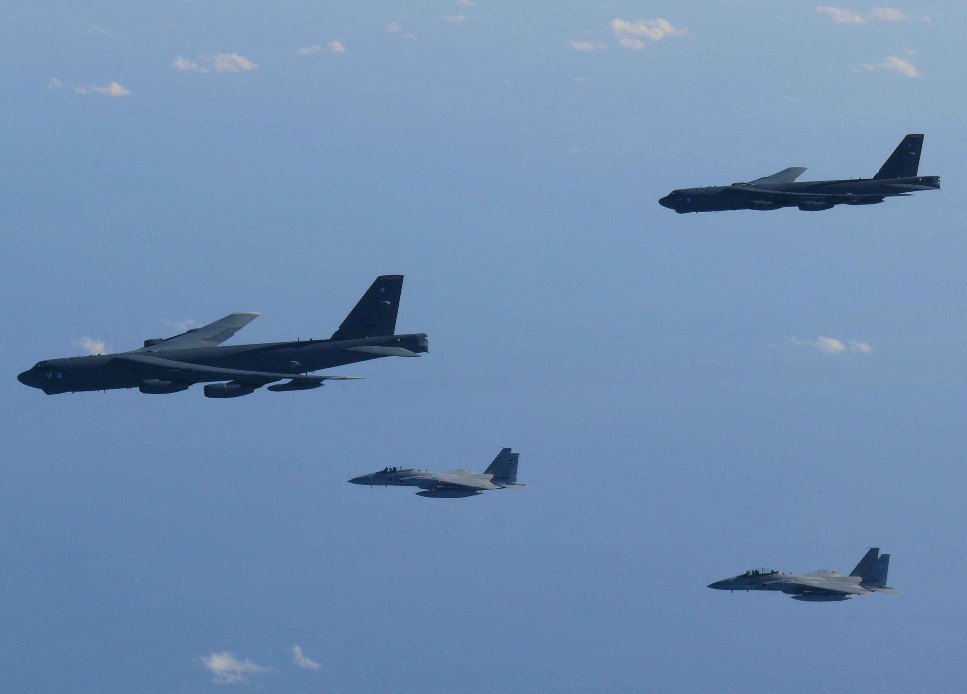 Japanese F-15 fighters and US B-52 bombers over the Sea of Japan. Photo: Defense Ministry of Japan via Reuters