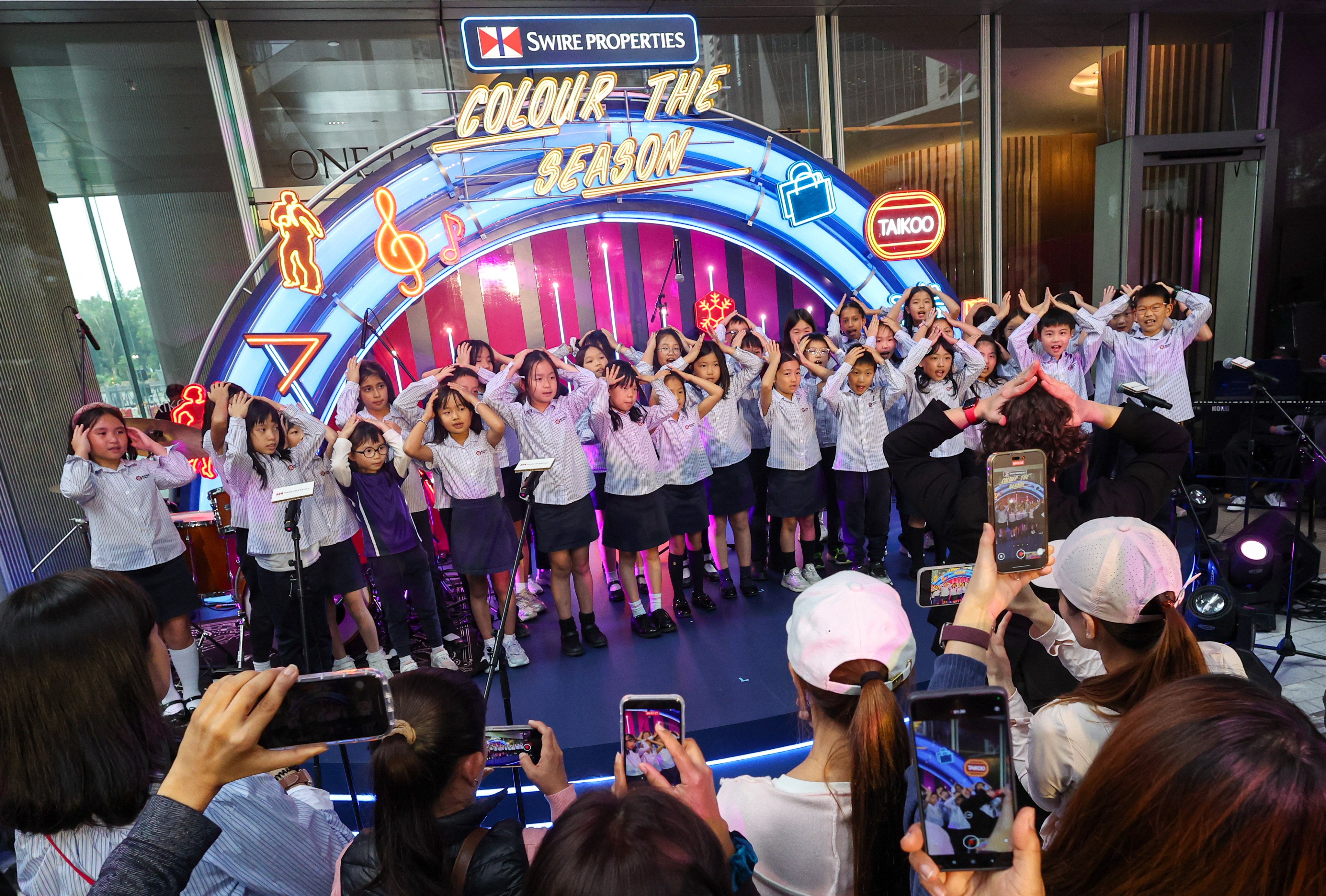 Children perform at the tree lighting ceremony for the White Christmas Street Fair. Photo: Dickson Lee