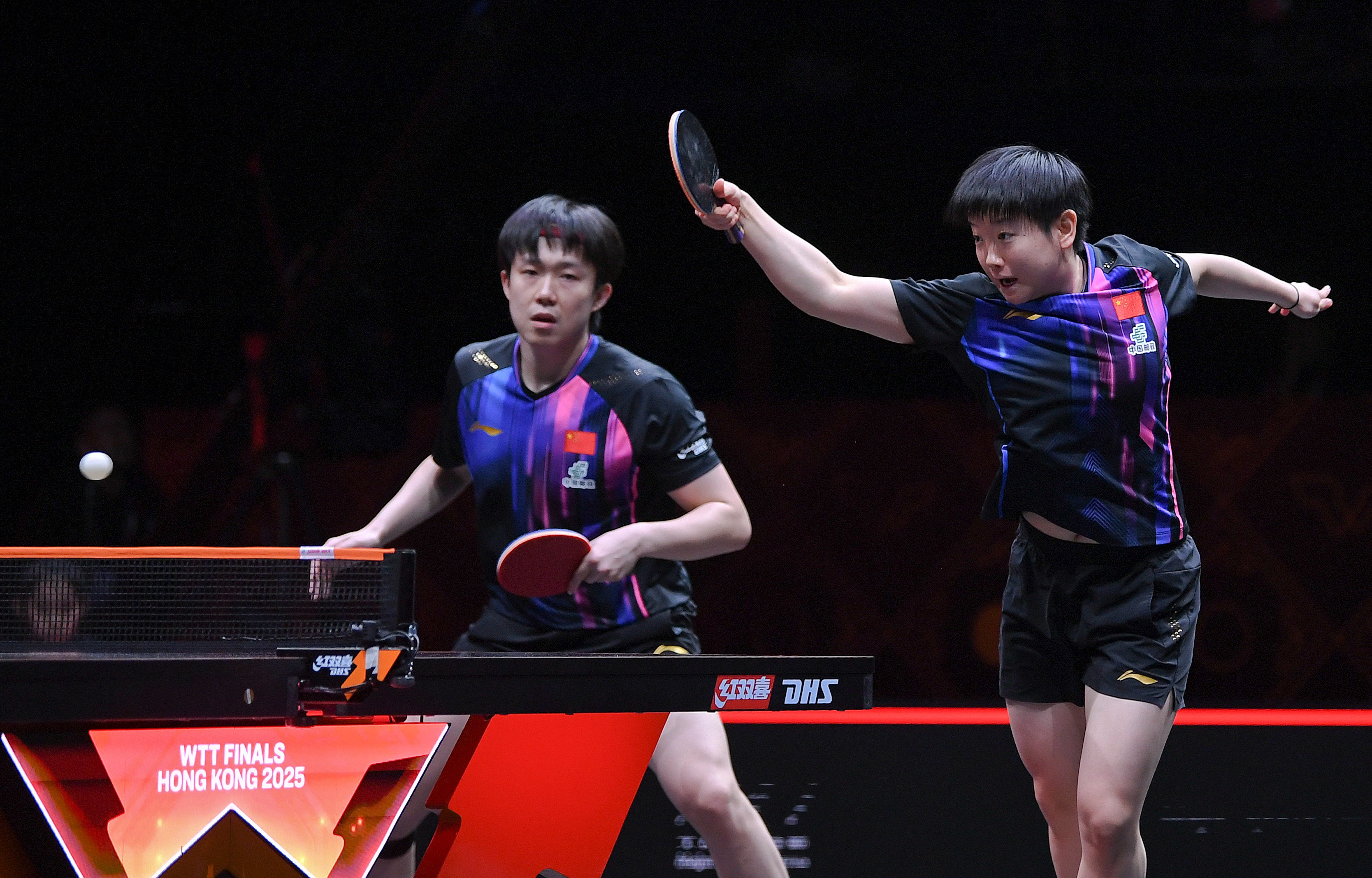 Wang Chuqin (left) and Sun Yingsha in action during their mixed doubles Group 1 match against compatriots Lin Shidong and Kuai Man. Photo: Xinhua