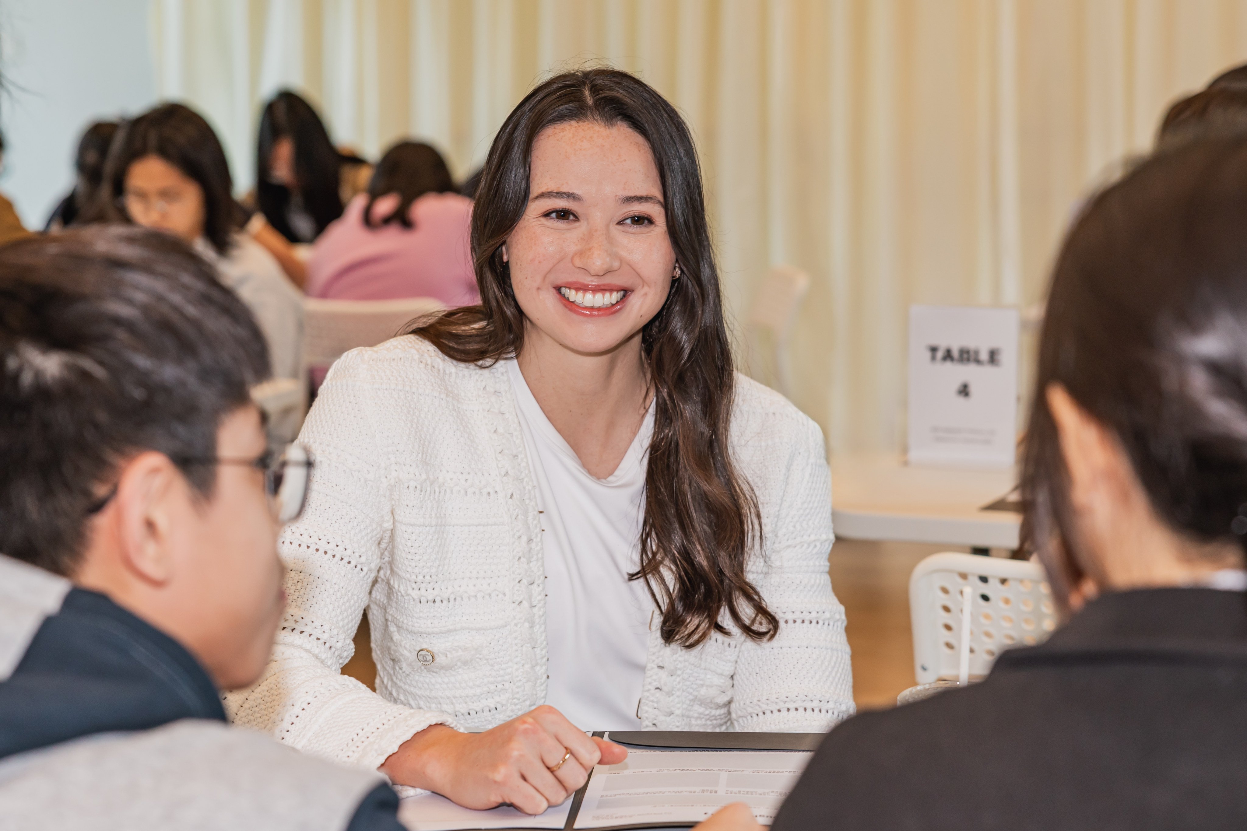 Hong Kong Olympian swimmer Siobhan Haughey chats with students at the “Empower through Reading” talk on December 7. Photo: Chanel