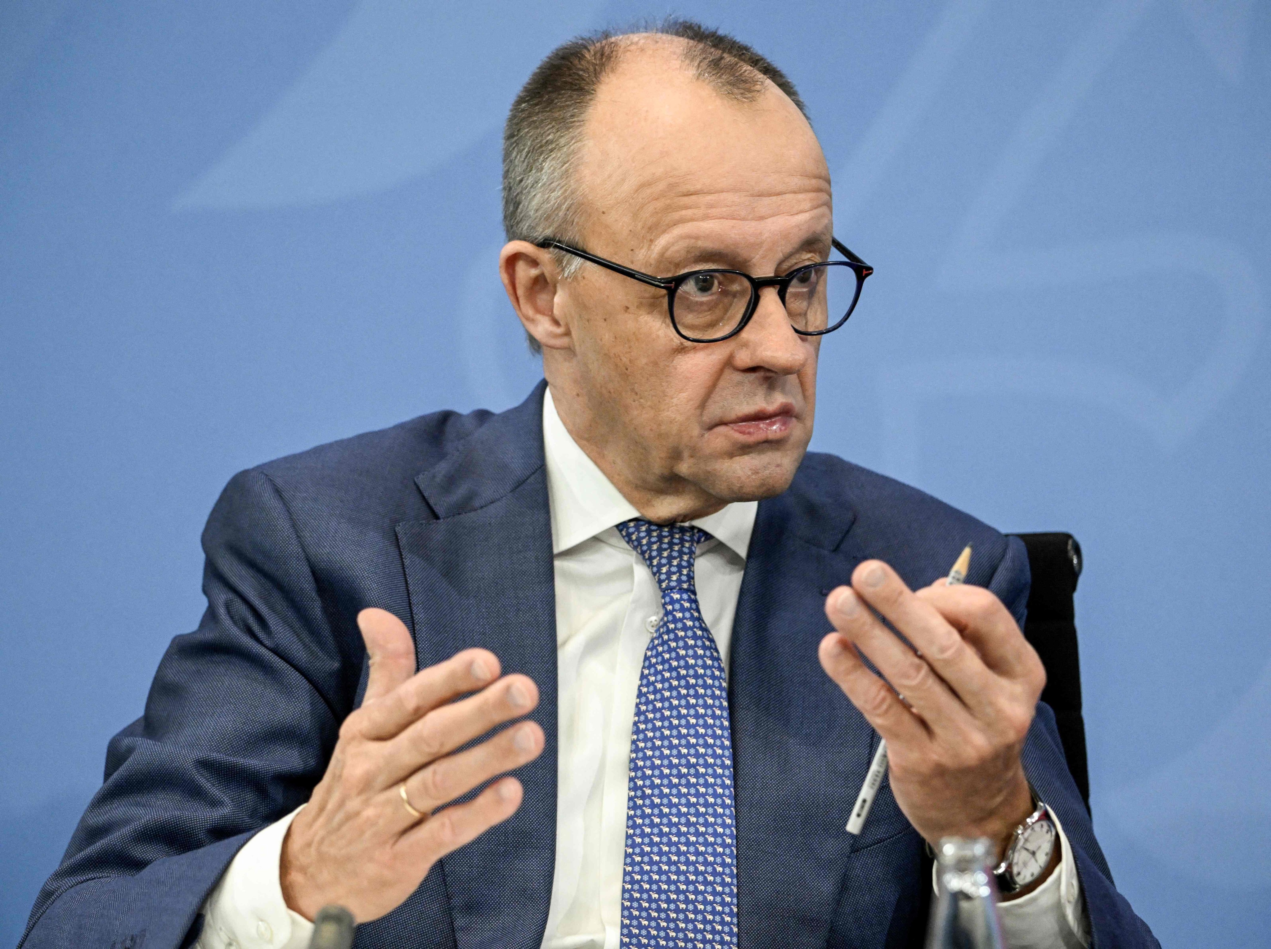 German Chancellor Friedrich Merz speaks during a press briefing in Berlin, Germany on Thursday. Photo: AFP