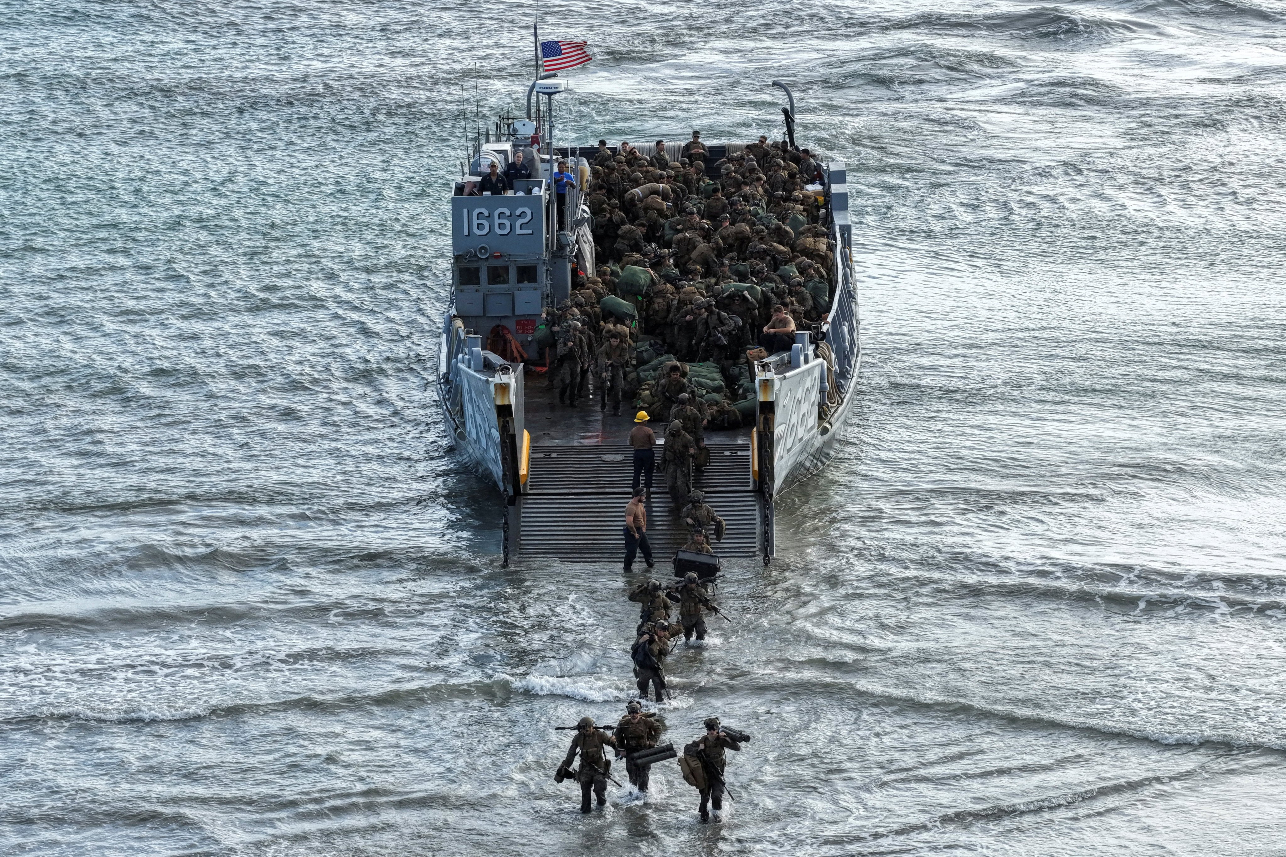 US Marines wade ashore from a landing craft during amphibious operations in Arroyo, Puerto Rico, on Tuesday. Photo: Reuters