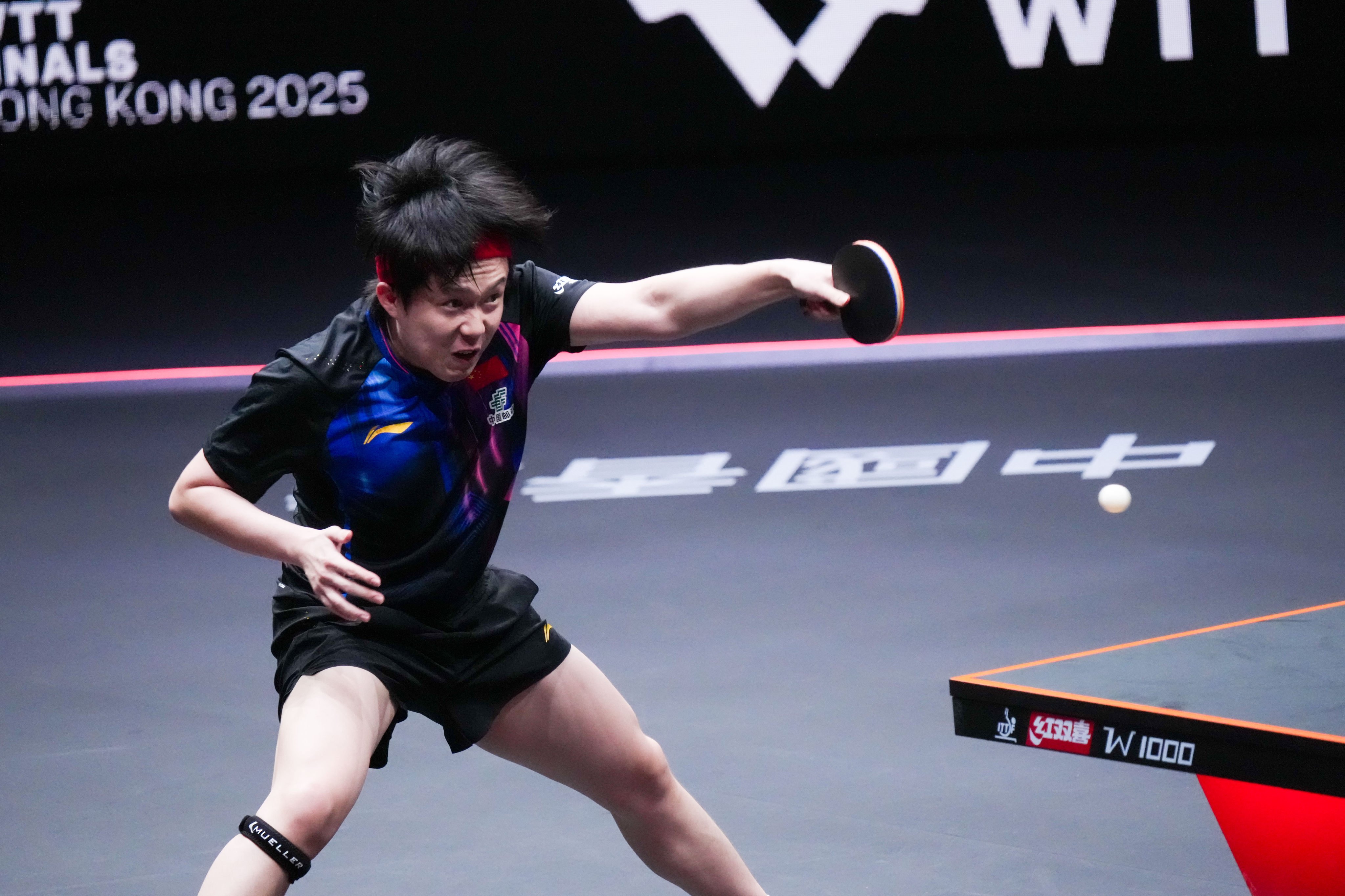 Wang Chuqin fires a return during his epic victory over Sora Matsushima. Photo: Xinhua